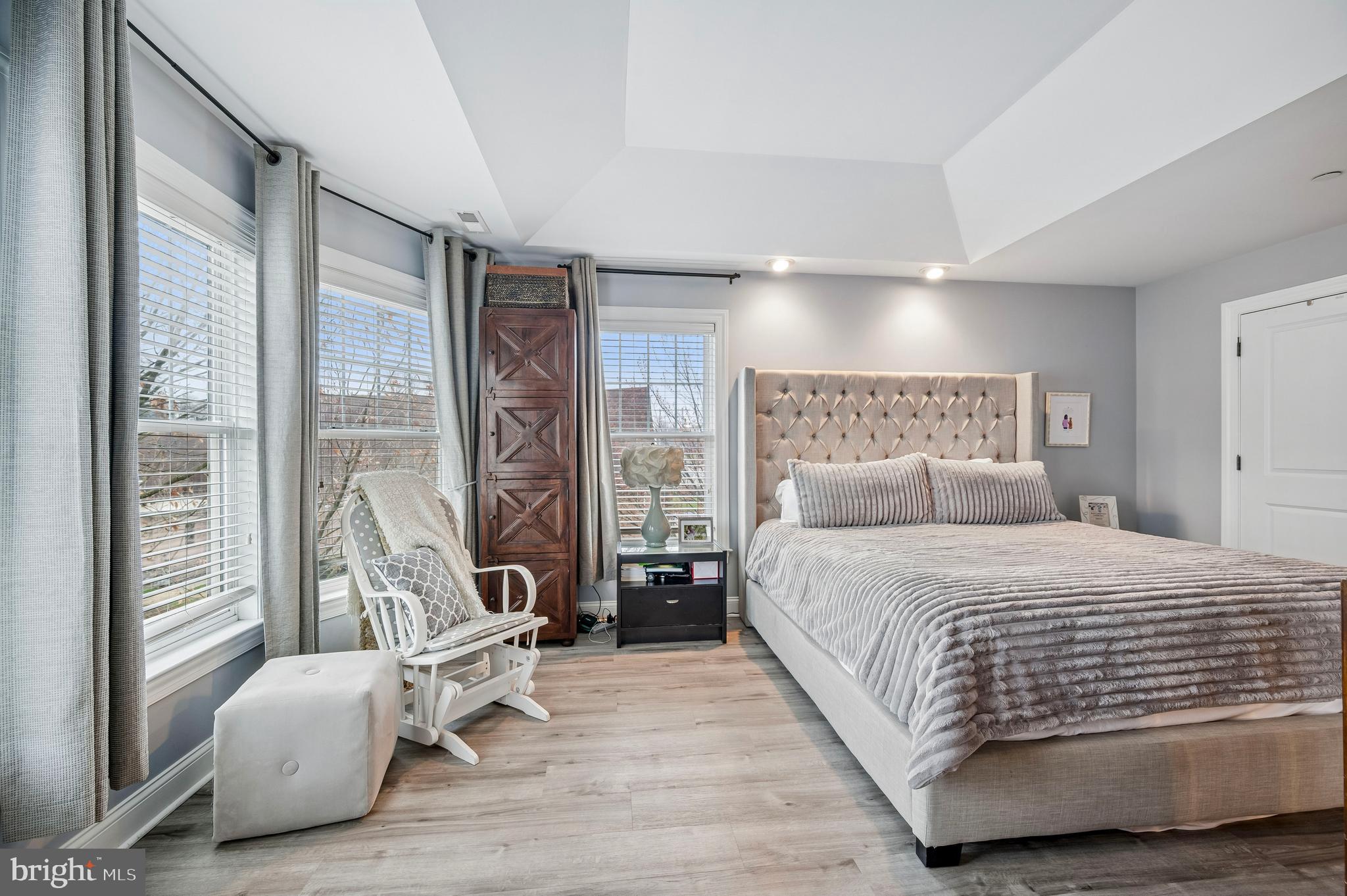 Wake up in the heart of the Main Line, grab coffee at Suburban Square, hop on the train to Center City, and come home to a beautifully maintained luxury townhome where exterior maintenance is someone else's responsibility.

This stunning 3-bedroom, 2 full and 2 half bath residence features elegant hardwood floors throughout and a thoughtfully designed layout perfect for both everyday living and entertaining. The modern kitchen is equipped with upgraded stainless steel appliances, ample cabinetry, and opens directly to a huge private deck—ideal for grilling, relaxing, and hosting friends on warm evenings.

The spacious living and dining areas provide plenty of natural light and a welcoming atmosphere. Upstairs, the primary suite and additional bedrooms offer comfortable retreats, complemented by tastefully remodeled bathrooms with modern finishes.

The first-floor bonus space adds incredible versatility and includes a half bath and walkout sliding glass door, making it perfect for a home office, gym, media room, or guest space.

Located just steps from Suburban Square, Ardmore’s premier outdoor shopping destination, you’ll enjoy walkable access to top restaurants, boutique shopping, cafes, and everyday conveniences. Commuting is easy with nearby regional rail access and major roadways.

Situated within the highly acclaimed Lower Merion School District, this home offers the perfect blend of luxury, location, and lifestyle in one of the Main Line’s most desirable communities.