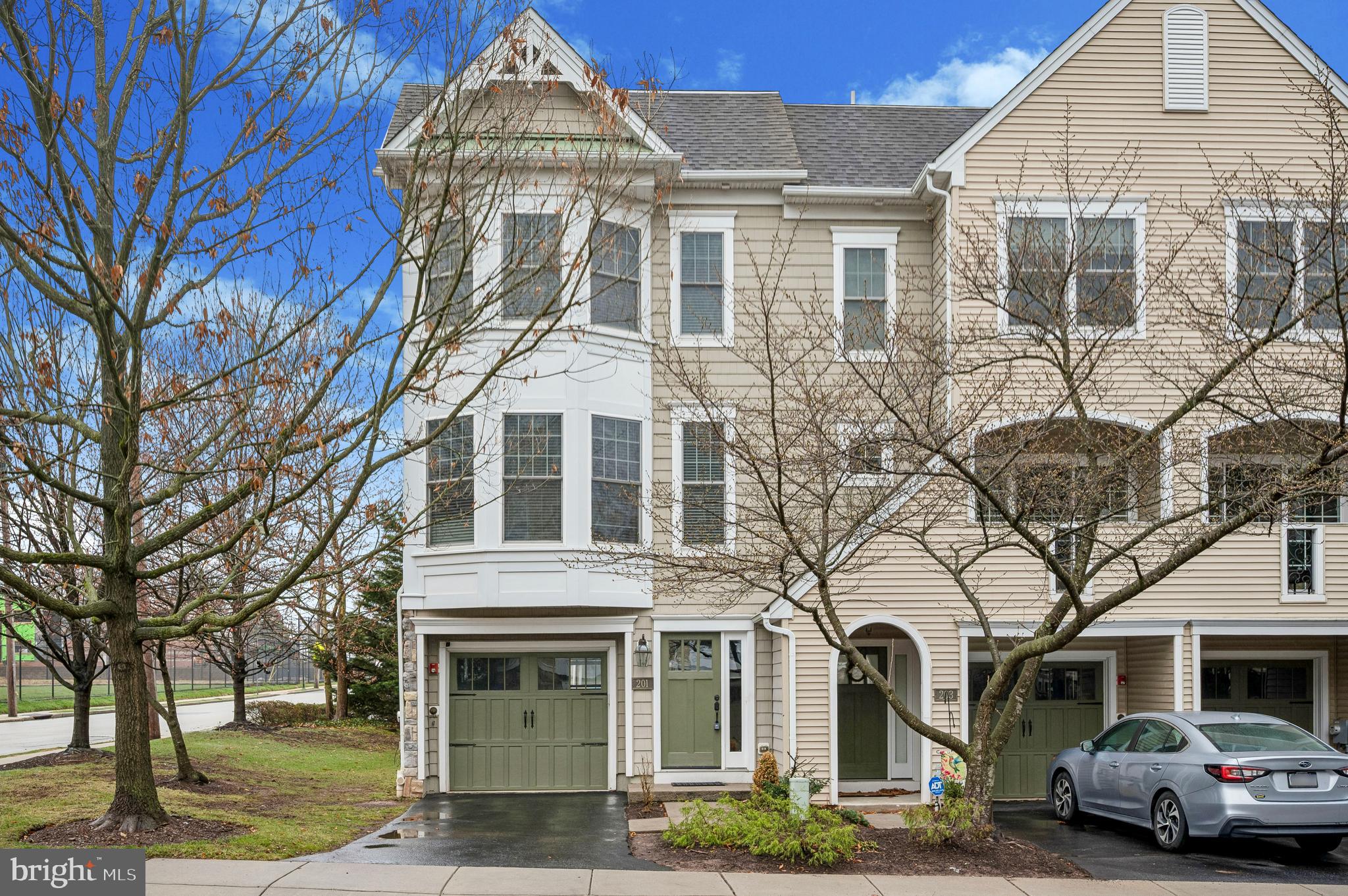Welcome to 201 Cobblestone Dr in the heart of Ardmore, a beautifully updated luxury townhome offering style, comfort, and an unbeatable Main Line location.

This stunning 3-bedroom, 2 full and 2 half bath residence features elegant hardwood floors throughout and a thoughtfully designed layout perfect for both everyday living and entertaining. The modern kitchen is equipped with upgraded stainless steel appliances, ample cabinetry, and opens directly to a huge private deck—ideal for grilling, relaxing, and hosting friends on warm evenings.

The spacious living and dining areas provide plenty of natural light and a welcoming atmosphere. Upstairs, the primary suite and additional bedrooms offer comfortable retreats, complemented by tastefully remodeled bathrooms with modern finishes.

The first-floor bonus space adds incredible versatility and includes a half bath and walkout sliding glass door, making it perfect for a home office, gym, media room, or guest space.

Located just steps from Suburban Square, Ardmore’s premier outdoor shopping destination, you’ll enjoy walkable access to top restaurants, boutique shopping, cafes, and everyday conveniences. Commuting is easy with nearby regional rail access and major roadways.

Situated within the highly acclaimed Lower Merion School District, this home offers the perfect blend of luxury, location, and lifestyle in one of the Main Line’s most desirable communities.