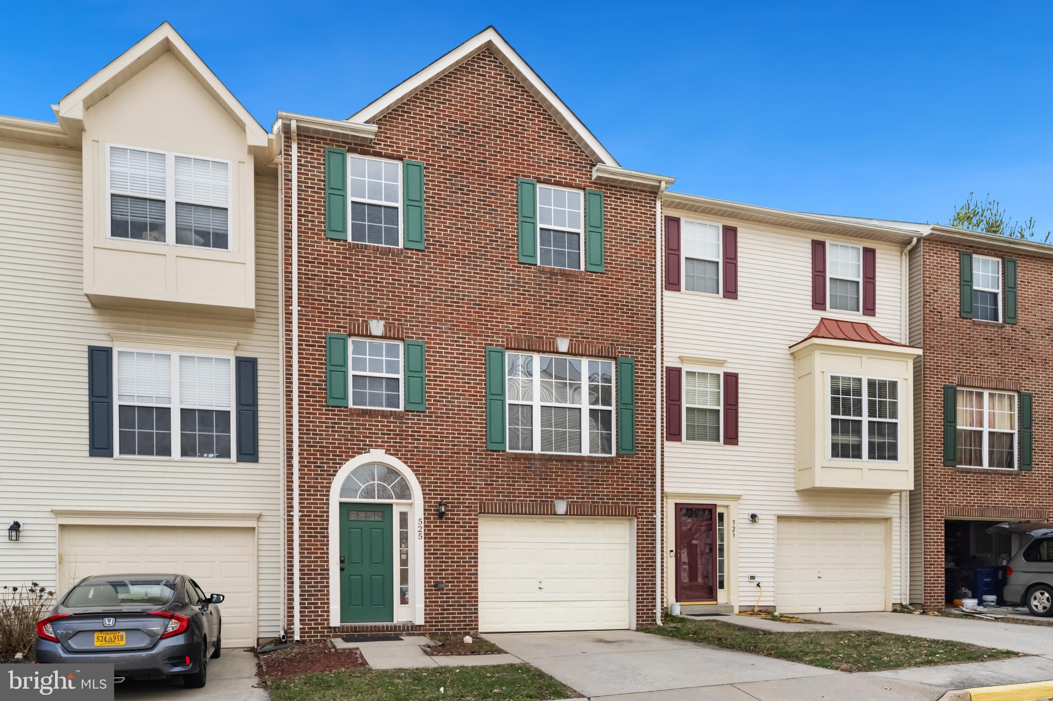 Welcome to 525 Sparkleberry Terrace NE, a beautiful three-level townhouse nestled in the sought-after Sycamore Hill community in Leesburg, VA. This charming property offers approximately 2,000 square feet of living space, featuring 3 bedrooms, 2.5 bathrooms, and an attached front-loading 1-car garage. As you enter, the lower level greets you with a versatile and completely open space, perfect for a home gym, office, or even an auxiliary bedroom. This area features stylish luxury vinyl plank flooring and provides direct walk-out access to the expansive, fully fenced backyard, ideal for entertaining or relaxation. The inviting main level boasts gleaming hardwood floors throughout, highlighting a spacious and adaptable living area suited for any furniture arrangement. At the heart of this home is a generously sized kitchen complete with a central island, granite countertops, ample cabinetry, and dedicated space for your coffee or dining table. Enjoy outdoor dining or your morning coffee on the full-size deck conveniently located off the kitchen, overlooking serene wooded common reserve land across the street. A thoughtfully placed half bath completes this level.

Retreat to the upper level, where comfort meets practicality. Here you'll find three well-appointed bedrooms, each equipped with ceiling fans and ample closet space. The primary bedroom suite is a tranquil escape, featuring a spacious walk-in closet and an en-suite bath with dual vanities and a relaxing soaking tub. A full hallway bath and convenient laundry area with washer and dryer complete this level. The desirable Sycamore Hill community offers exceptional amenities including an outdoor swimming pool, tennis courts, playgrounds, and basketball courts, all just a short stroll from your doorstep. Enjoy the convenience of nearby shopping and dining options such as Home Depot, Costco, Leesburg Outlets, and charming downtown Leesburg. Commuting is a breeze with easy access to Route 7, Route 15, and the Dulles Toll Road. Don't miss the opportunity to call this meticulously maintained property home!