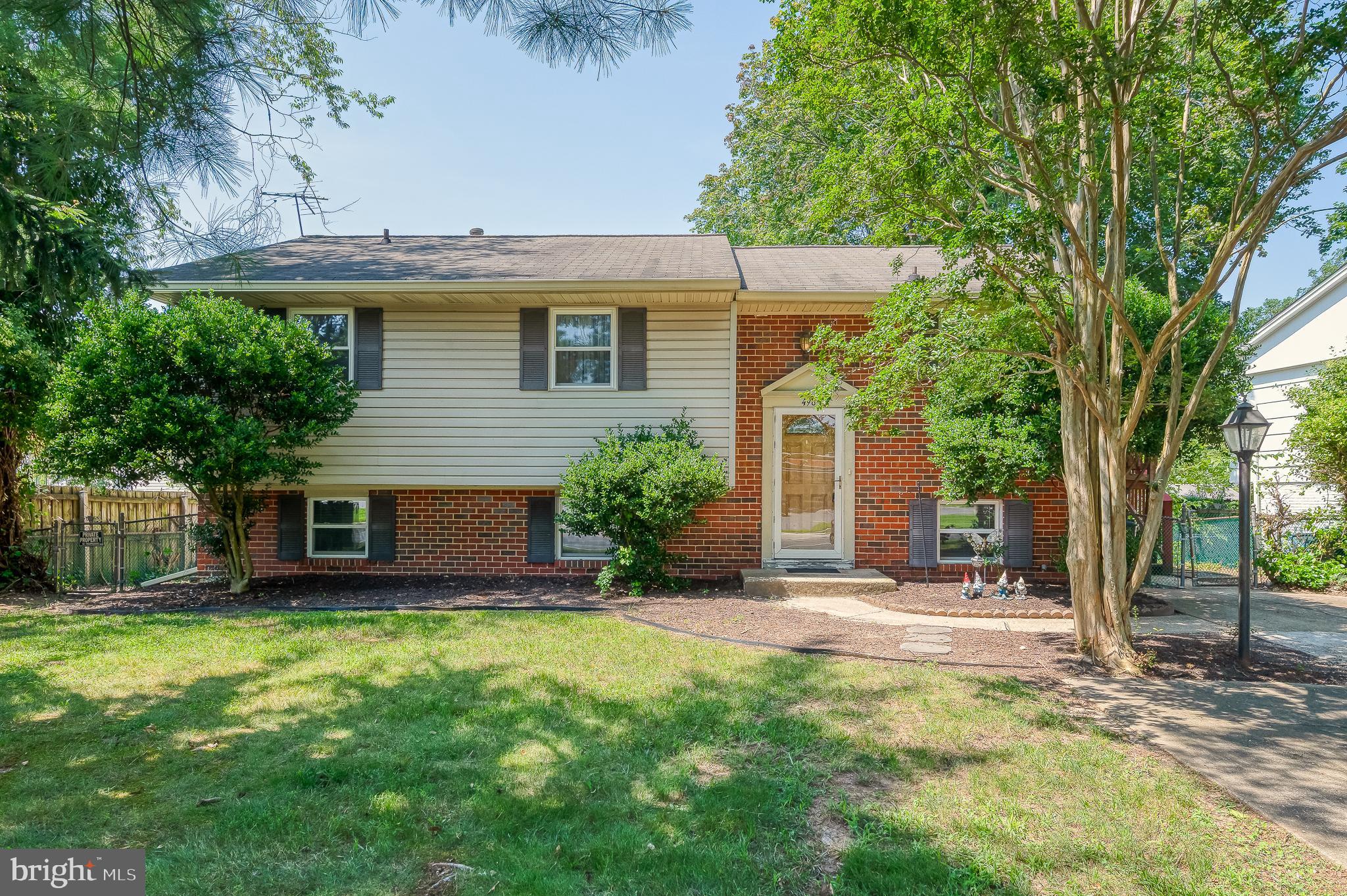Enjoy all that the Village of Olde Mill has to offer! Just a short walk to Barlowe Field, parks, playgrounds, basketball courts, the community pool, and year-round neighborhood events hosted by the active association. Also located within walking distance to the local schools, this home also features a flat, fenced rear yard and spacious deck, perfect for entertaining. The convenient location provides easy access to shopping, dining, and commuter routes. The lower level has been beautifully remodeled in recent years with a new full bathroom, luxury vinyl plank flooring, sliding glass door, as well as fresh drywall and paint. Upstairs, the eat-in kitchen offers maple cabinets and stainless steel appliances, while the upper level could easily shine with just new carpet, wallpaper removal and a fresh coat of paint, providing an excellent opportunity to add value and make it your own. Swim club memberships available.