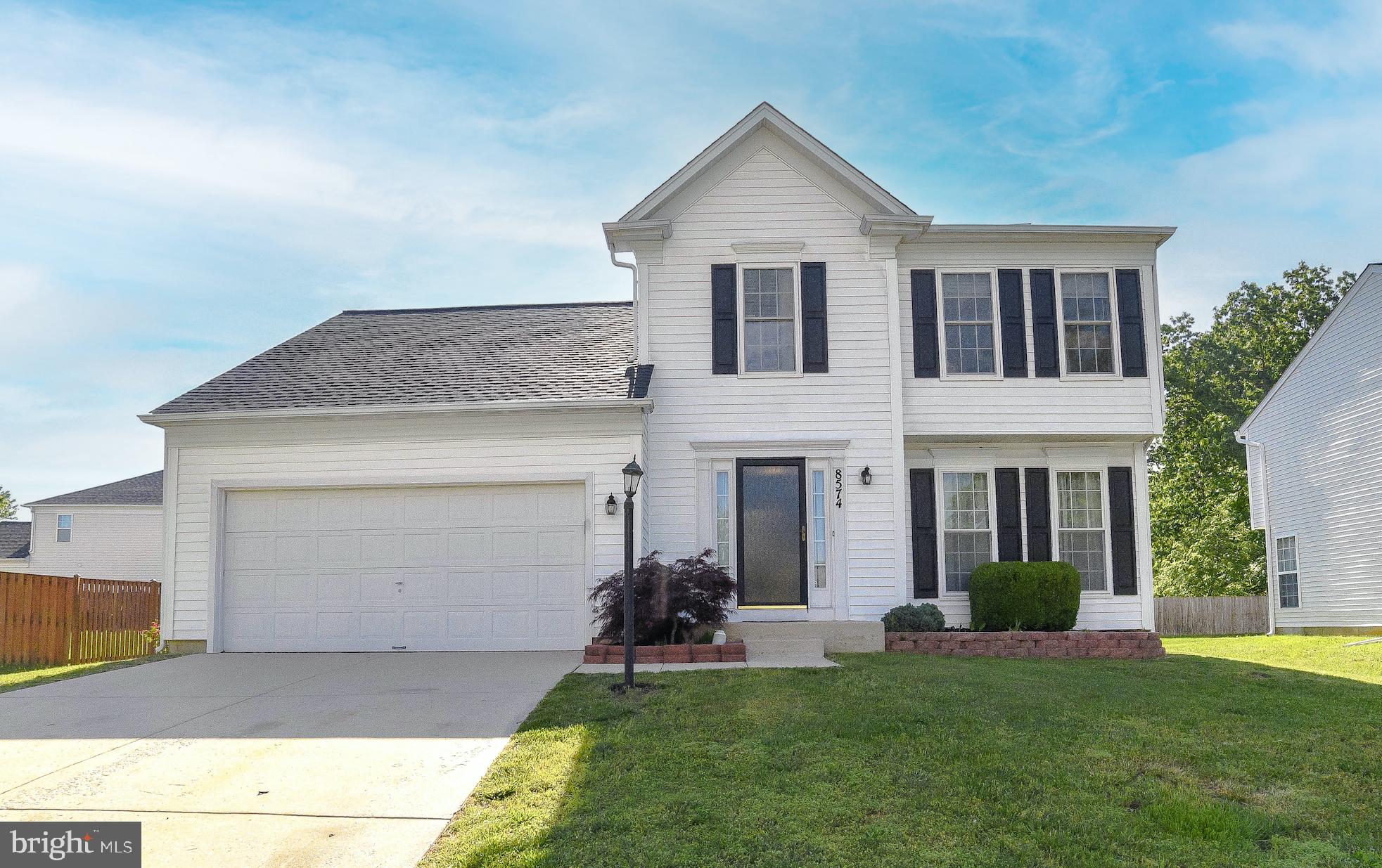 This well maintained home in the desirable neighborhood of Kingsview Subdivision could be your next destination!  Hardwood flooring runs throughout most of the main level. Feel free to snuggle up by the gas fireplace in the den or read a good book in the formal living area.  The kitchen has been redone with a tile floor, white cabinets, granite countertops, tile backsplash and wonderful charcoal stainless appliances.  Off the kitchen you can unwind out back on the large patio with a new sliding glass door or roast marshmallows by the firepit. The backyard is fully fenced offering privacy for entertaining or the security of knowing your little ones are playing safely nearby. Also, rest easy with the knowledge of 90% of all the windows in this home are new as well. There are four bedrooms upstairs and two full baths. The basement area is a gem. It's here that you'll find a built in bar and a beautifully redone full bath with large walk-in shower.  There is also a large unfinished storage area for your convenience. The roof and furnace are each less than 5 years old.