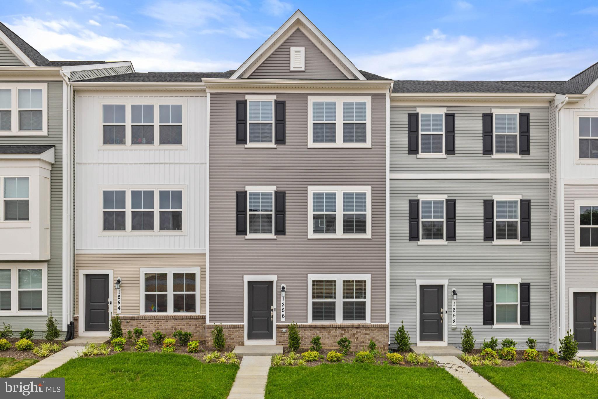 Welcome to this pristine, never-before-lived-in Lancaster townhome—offering an abundance of natural light across three finished levels. With three spacious bedrooms, two full baths, two half baths, and a two-car garage, this residence seamlessly blends style and function.

On the entry level, a versatile recreation space awaits—perfect as a home office, gym, or media lounge—alongside a convenient powder room and rear-entry two-car garage. The main level features a modern open-concept layout that flows effortlessly from the expansive Great Room to the dining area and chef-inspired kitchen, complete with upgraded granite countertops, premium cabinetry, and stainless steel appliances. Step outside to a generous 10x18 deck—ideal for entertaining or enjoying your morning coffee in the fresh air.

Upstairs, the private owner’s suite features a luxurious en-suite bathroom and a walk-in closet, accompanied by two additional bedrooms and a full bath—providing space for everyone to feel at home.

Nestled just minutes from Charles Town and Ranson, Red Clover Meadows offers easy access to local favorites like Martin’s, Weis, Marshalls, Kohl’s, Five Guys, and more. Major conveniences like Home Depot and McDonald’s are also nearby.

Tenant Information: Monthly Rent: $2,100, Security Deposit: $2,100, Pets case by case basis, Pet deposit $500, Minimum credit score: 650, Income requirement: 3x monthly rent. Tenant covers: lawn care, electricity, cable/internet, water/sewer, trash. Landlord covers: HOA dues. Application via RentSpree—link available in the listing. Step into easy living with high style and low maintenance—this stunning townhome is ready to welcome its first resident.