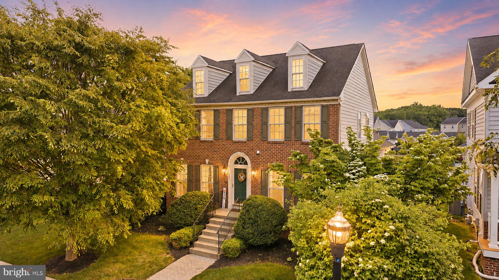 603 Taurus Ave, a beautifully maintained brickfront Colonial nestled in the picturesque community of Meridian Crossing. Offering approximately 3,000 square feet of thoughtfully designed living space, this exceptional 4–5 bedroom, 3.5 bathroom home sits directly across from community parkland delivering rare open views, natural light, and a sense of privacy that is simply hard to find in today's market. From the moment you arrive, the home's full brick facade, mature landscaping, arched entry door, and classic shutters create an impressive first impression that sets the tone for everything inside. Step through the front door into a welcoming foyer where rich hardwood floors flow throughout the entire main level. To the left, the formal living room offers a peaceful retreat with large bay windows, abundant natural light, and elegant crown molding. Across the foyer, the formal dining room provides the perfect setting for entertaining, complete with chair rail detail, crown molding, hardwood floors, and a stylish contemporary chandelier. The heart of the home is the open family room, where a stunning floor-to-ceiling stone fireplace serves as the dramatic focal point, ideal for cozy evenings at home. The kitchen is both beautiful and functional, featuring white cabinetry, gleaming quartz countertops, a classic tile backsplash, and stainless steel appliances. A charming eat-in breakfast nook with banquette seating and a double window rounds out the space, making this a kitchen the whole family will love. Upstairs, the spacious primary suite is a true sanctuary. The en suite bathroom is impressive, showcasing travertine tile throughout, a deep soaking tub, a separate glass-door shower, and a generous double-sink vanity, everything you need to start and end your day in style. Three additional well-sized bedrooms, each with ample closet space, and a full hall bathroom complete the upper level. The fully finished lower level is one of this home's most versatile and valuable features. A large open recreation room offers endless possibilities, home theater, playroom, gym, or additional living space, while a private fifth bedroom and full bathroom make it ideal for guests, an au pair, multigenerational living, or a dedicated home office suite. Outside, the backyard is an entertainer's paradise. A gorgeous pergola with ceiling fan and privacy curtains creates a true outdoor living room, the perfect space for summer gatherings, morning coffee, or simply unwinding after a long day. The professionally landscaped yard is beautifully maintained and provides a private, serene setting that complements the parkland views out front. Additional highlights include a half bath on the main level for guests, a well-designed layout that balances formal and casual living spaces, and an unbeatable location. Situated in Bear, DE, residents enjoy easy access to Route 1, Route 40, I-95, and the Chesapeake & Delaware Canal, with shopping, dining, and recreation all just minutes away. And as an added bonus  Delaware has no sales tax, offering everyday savings that buyers relocating from neighboring Pennsylvania, New Jersey, and Maryland will immediately appreciate.