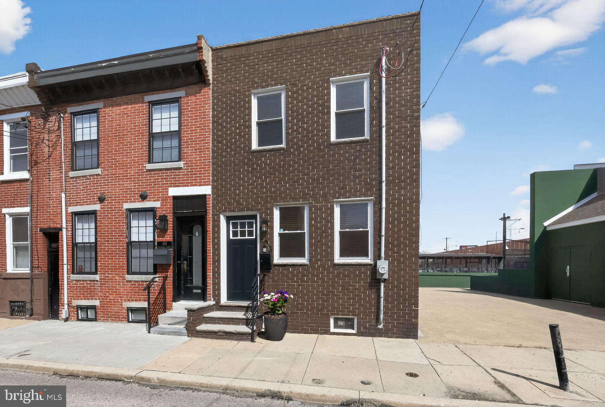 So you’re strolling down McClellan St in Pennsport, and little do you know that one of these rowhomes is not like the others!
Hit the corner lot and you've arrived at 103, a smart house with ALL the features dialed in:
Ring doorbell to screen for packages and unwanted guests, NEST thermostat that learns what you like, lights you can control from your couch, heated shower floors...
Maybe it sounds a little bougie, but trust me - you deserve it!
Main layout is wide open with quality hardwood floors throughout and upstairs as well.  Kitchen’s stacked with stainless steel everything, white quartz countertops, shaker cabinets with lighting underneath.  There's even a pot filler right by the stove!  Because sometimes just walking to the sink feels like a journey these days.
Two bedrooms and two full baths; the primary's got real marble (not the fake stuff) and those heated floors I mentioned.  The basement has loads of room for storage and a custom, built-in, not-dungeony trap door you can have fun descending through.  As far as systems and appliances, everything’s newer—electric, HVAC, plumbing, washer, dryer.
But wait... there's more:
The home has a Rivian charger so the EV folks are all set.  Plug it in, walk away, done.
Backyard’s got a HOT TUB (included!) and room for a table, chairs, grill, plants, whatever you need to complete your private oasis. With 4.5 year left on the tax abatement, this home has everything.
Location is walking distance to Snyder Plaza, Target, all that stuff; also super close to Passyunk, FDR park, stadiums... you get the picture.
Right?