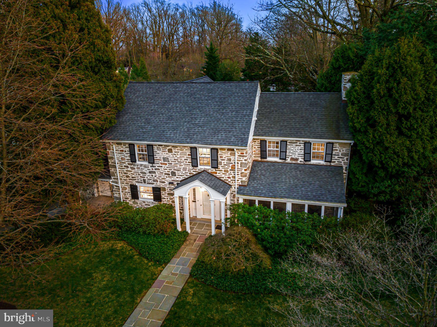 Look no further. This the Penn Valley gem that you have been looking for with incredible 1930's stone exterior, classic architectural designs and materials, sun-filled gracious rooms throughout and set on a stunning .45 acre flat lot in a quiet, "walk to everything neighborhood.  Charming features include a classic front to back foyer with inviting living and dining rooms looking out over the breathtaking rear grounds with expansive flagstone patio, white kitchen with center island and adjacent breakfast room/ home office area, original restored oak floors, some of which have been protected with carpeting, beautiful restored millwork and moldings, spacious primary suite with walk-in dressing room, extensive built-ins and private bathroom, second and third bedrooms with a shared full bathroom, and the fourth bedroom off the back kitchen staircase with a full bathroom, also accessible from the main staircase. The walk-up attic could also be finished to accommodate another bedroom suite, office or playroom. This very special home has been lovingly maintained by the same owners for decades and is now awaiting the next lucky owners! Just minutes from renowned public and private schools and Universities, fabulous restaurants and stores in "walk-to" Narberth, trains, clubs, recreational facilities, Center City Philadelphia and more.