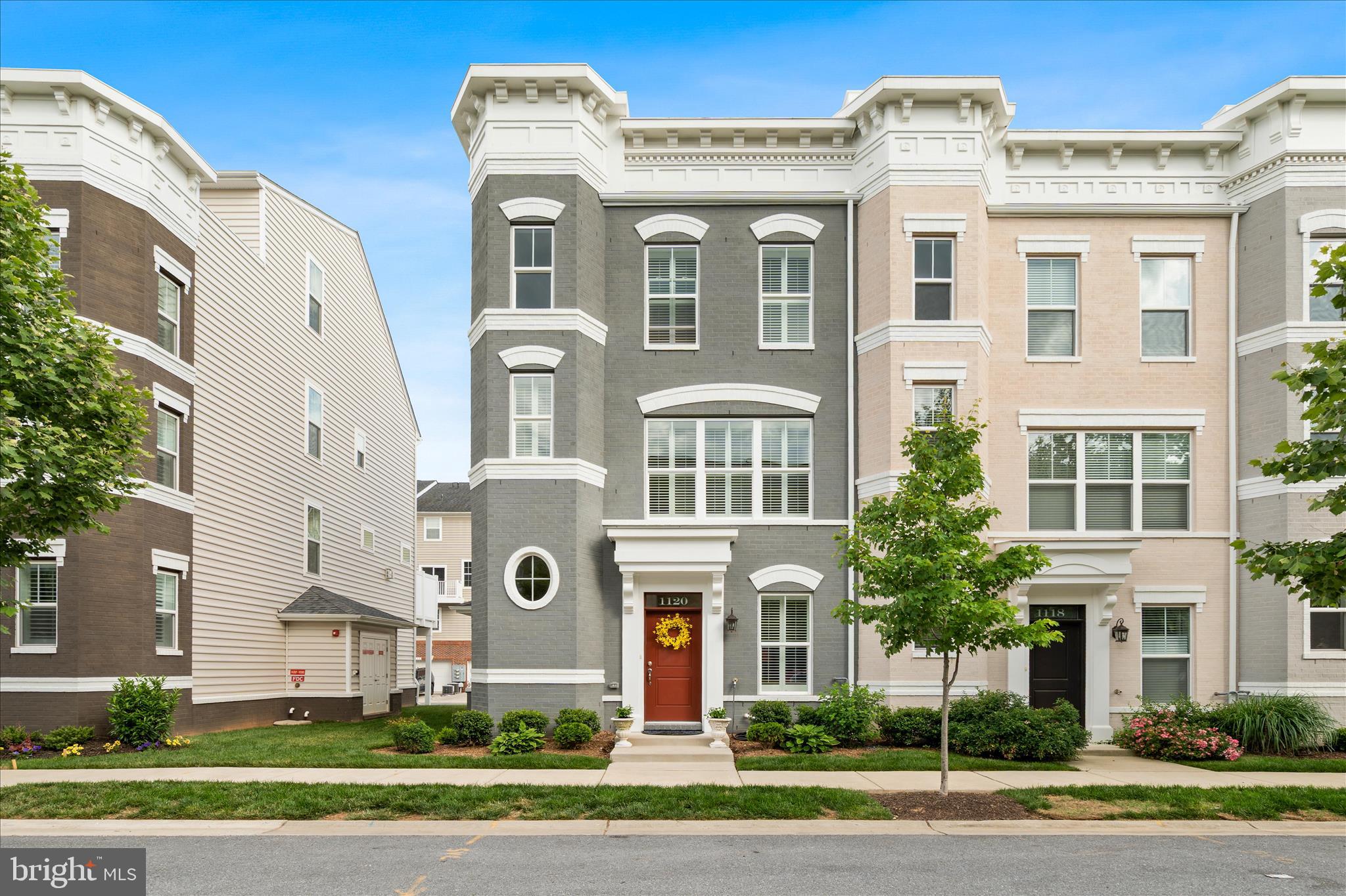 Meticulously maintained end-unit townhome in Eastchurch with an ELEVATOR for incredible ease and peace of mind. Welcome to Wormald build Luxury, featuring four finished levels, four full baths, a half bath, and not one but two outdoor retreats! As an end unit, this home boasts eight additional windows flooding every level with natural light, beautiful LVP flooring and custom-made wooden shutters flow throughout the entire home. The entry level offers a flexible bedroom or home office with a full bath featuring a quartz countertop. The main level dazzles with a formal dining room anchored by a custom chandelier, an upgraded half bath, a deck for outdoor dining, and a chef's kitchen. The chef's kitchen is outfitted with KitchenAid refrigerator, dishwasher and stovetop, a new GE oven and microwave, ceiling-height cabinetry, and an additional cabinet across from the island. The third level hosts a serene primary suite with an ensuite bath featuring a custom added window, plus an additional bedroom and full bath. The crown jewel? A fourth-level bedroom with a quartz-topped full bath, additional storage, and access to a stunning rooftop deck with sweeping community views. All of this within Eastchurch's walking paths, playground, clubhouse, and community pool - with Monocacy Village Park and Downtown Frederick's dining, breweries, and shops just minutes away. The home falls under the condo ownership section of Eastchurch, which affords the buyer peace of mind that all exterior aspects of the structure including roof, windows and walls are covered under the condo's master insurance policy. This one truly has it all!