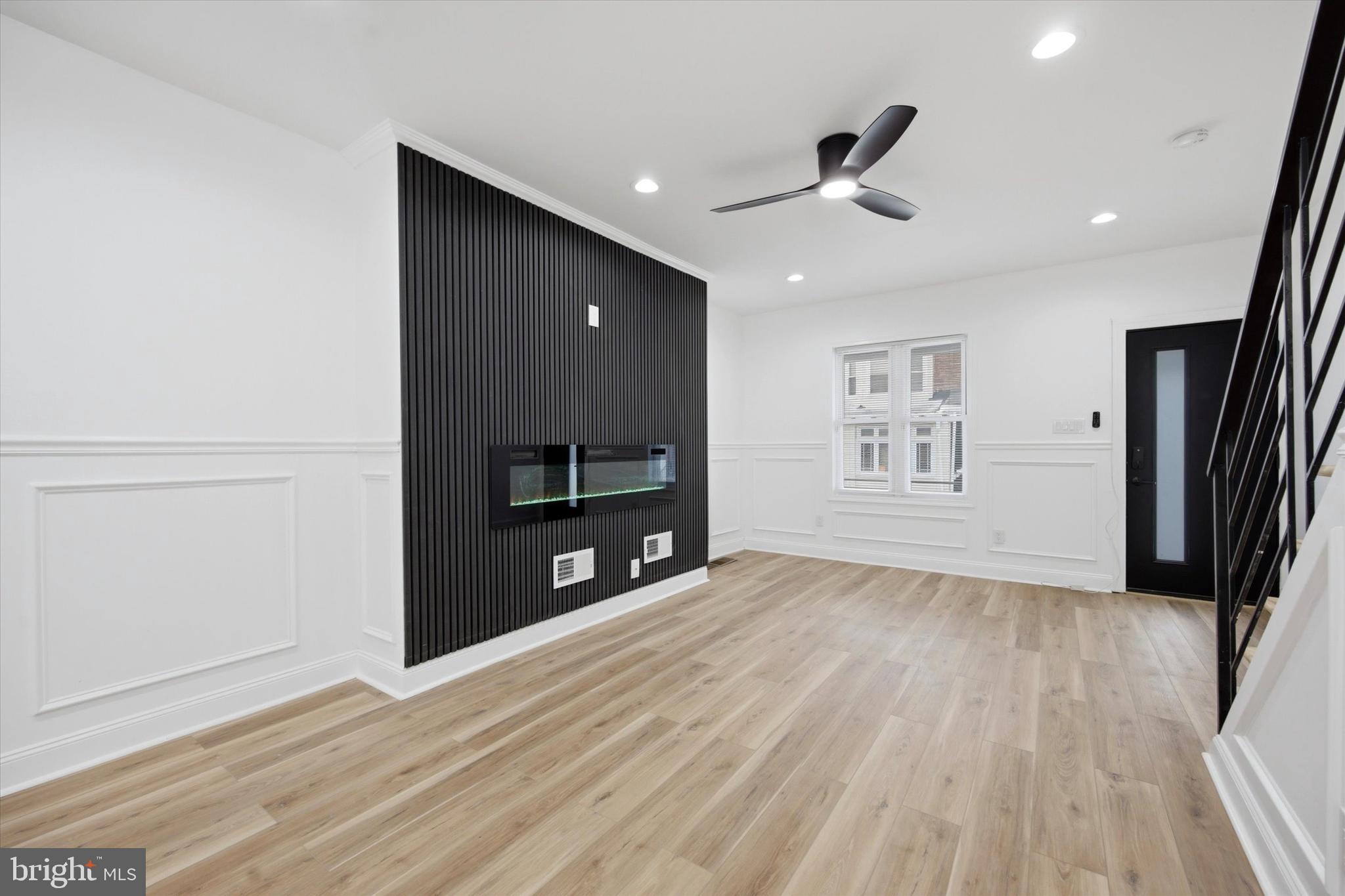 Coming soon to Cobbs Creek, this beautifully renovated home perfectly blends modern upgrades with classic charm. From the moment you walk through the front door, you’re greeted by a bright, open-concept living and dining area. The space feels both stylish and cozy, anchored by a custom media wall with a built-in electric fireplace. Throughout the main floor, you’ll notice elegant wainscoting on the walls, luxury vinyl plank flooring, and plenty of light from the recessed and LED fixtures. The kitchen is designed to be the heart of the home, featuring clean white shaker cabinets with soft-close hinges, durable quartz countertops, and stainless steel appliances. Just off the kitchen, there’s a major perk: a dedicated main-floor laundry room. It comes ready to go with a full-sized washer and dryer, plus a ton of shelving and hanging space to keep everything organized. For year-round comfort, the home includes central air, and if you head outside, you’ll find a private, fenced-in backyard perfect for grilling, gardening, or just letting the dog run around. Upstairs, there are three good-sized bedrooms, each equipped with ceiling fans, recessed lighting, and plenty of closet space. The bathroom feels like a mini-spa, featuring a trendy barn-style sliding door, clean tile work, and a heated towel rack to make your mornings a little more comfortable. Every inch of this house was updated with both quality and everyday living in mind. Conveniently located near major routes, public transportation, shopping, and neighborhood amenities, this home delivers the perfect blend of modern living and city convenience. This home won’t last long, schedule your showings today!
