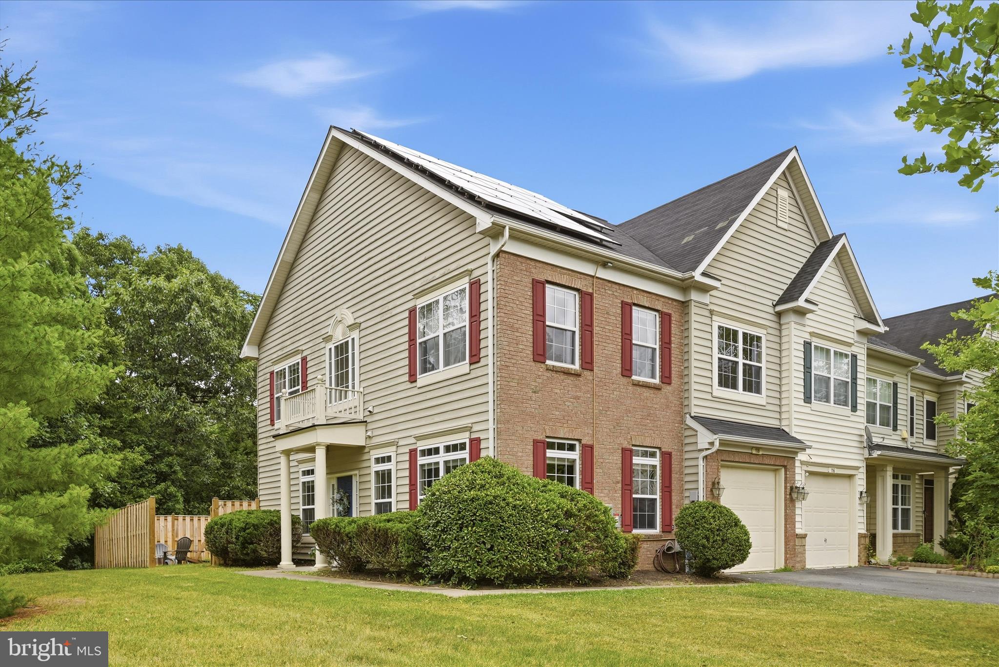 The end unit townhome you have been waiting for in Wakeland Manor!  The main level features 9' ceilings, an open, vaulted entryway, updated LVP flooring, gas fireplace, and a main level bedroom or large office.  Open kitchen showcases stainless steel appliances, upgraded cabinets and pantry.  Moveable island can convey. Transom and bay windows flood the main floor with natural light.  With only one attached neighbor, so much sunlight and backing to trees/common space, inside truly feels like a single family home.  Upstairs hosts a generiously sized primary suite with LVP flooring, walk in closet, dual sinks, shower and soaking tub. Laundry room on upper level.  Newer fence creates usable backyard. One car attached garage along with driveway parking.  Neighborhood amentities include trash pick up, snow removal, clubhouse, pool, basketball courts, tennis courts, playground and fishing pond.  Solar panel contract assumable. Priced under market value!