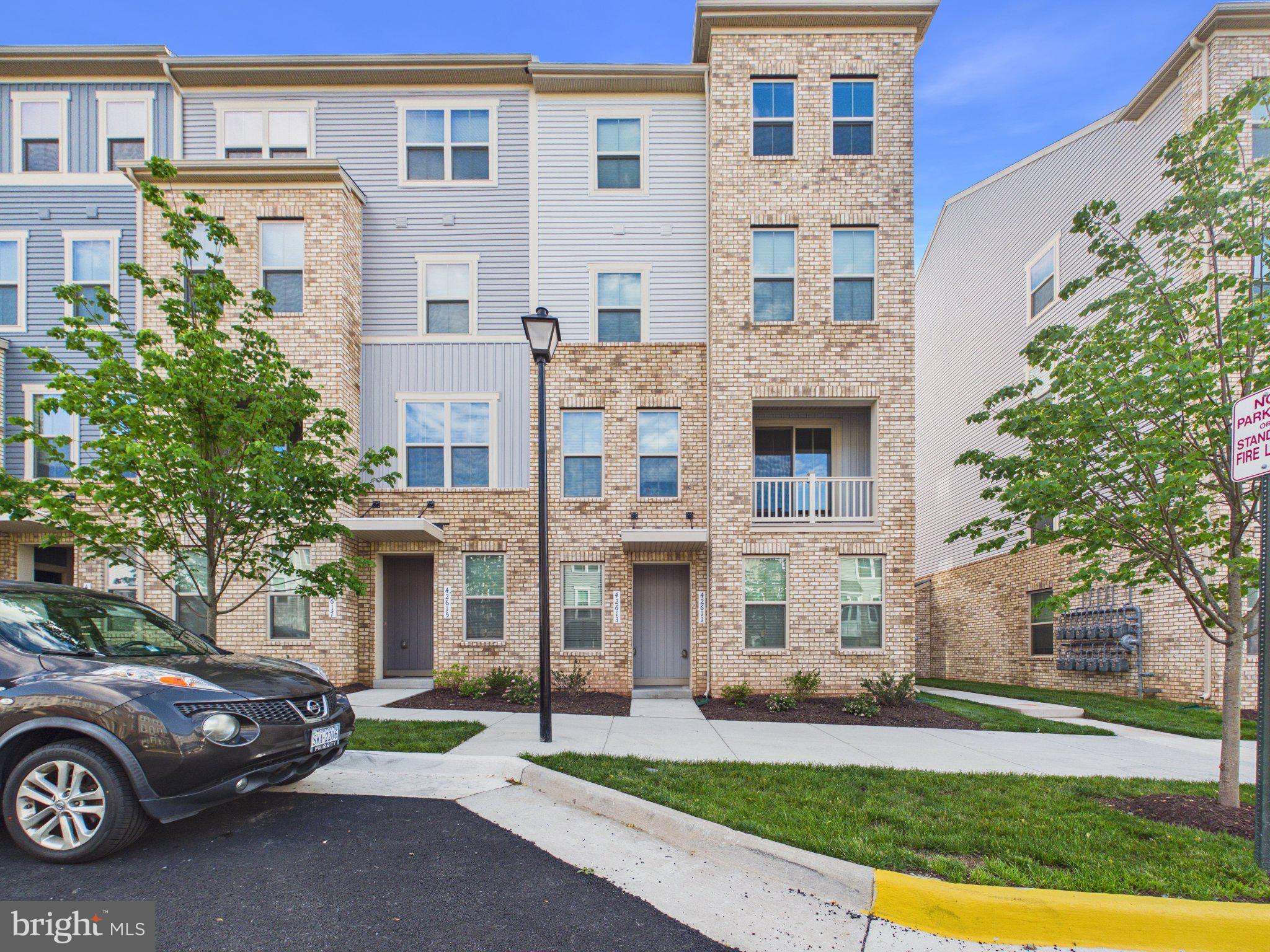 Welcome to this nearly new, four‑level townhome in the highly desirable Arcola Town Center community — a perfect blend of modern design, comfort, and unbeatable convenience. Facing North-East Entrance
Built just one year ago, this contemporary home features 3 spacious bedrooms, 2.5 baths, and a versatile entry‑level flex space ideal for a home office, media room, gym, or guest area. The thoughtful layout offers flexibility to match your lifestyle.
The open‑concept main level is bright and inviting, highlighted by a gourmet kitchen with a large quartz island, stainless steel appliances, upgraded cabinetry, and generous counter space — perfect for everyday living or entertaining. Step outside to the extended deck, ideal for gatherings, grilling, or enjoying a peaceful morning coffee.
Additional features include a one‑car garage, modern finishes throughout, and low‑maintenance living with exterior upkeep handled by the association.
Located in a walkable, amenity‑rich neighborhood, Arcola Town Center offers a community pool, dog park, playgrounds, walking paths, and more. The monthly association fee conveniently includes exterior maintenance, lawn care, snow removal, trash service, and water.
You’ll love the unbeatable location — minutes from Dulles Airport, Route 28, Route 50, the Dulles Toll Road, and the Silver Line Metro. Everyday conveniences are just steps away at Arcola Shopping Center and Dulles Landing, featuring Walmart Supercenter, Wegmans, and a variety of dining and retail options.
Served by top‑rated Loudoun County schools — Elaine E. Thompson Elementary, Stone Hill Middle, and Rock Ridge High School — this home offers exceptional value in one of the area’s most sought‑after communities.
Don’t miss this opportunity to own a practically new home with upscale finishes, a prime location, and truly low‑maintenance living.