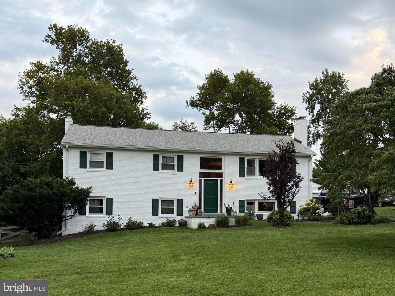 Opportunities like this don't come along often! Set on a picturesque ½-acre lot in the highly sought-after Oak Hill community, this beautifully maintained home offers the perfect combination of space, comfort, and an unbeatable location. Nestled beside Floris Elementary School, you'll appreciate the established neighborhood, mature trees, and generous yard that are increasingly hard to find.

Inside, the light-filled main level features an inviting open-concept design that's ideal for both everyday living and entertaining. The updated kitchen flows seamlessly into the spacious dining area and welcoming family room, creating the heart of the home. Three generously sized bedrooms and two full bathrooms complete the main level.

The finished lower level provides exceptional flexibility with a second family room, two additional bedrooms, and a full bath that is perfect for guests, multigenerational living, a home office or recreation space. A custom-built bar adds a unique gathering spot.

Step outside to enjoy the expansive deck and patio overlooking the private backyard, offering plenty of room for outdoor dining, relaxing, gardening, or hosting family and friends. The oversized detached two-car garage provides abundant space for vehicles, hobbies, storage, or a workshop.

Conveniently located, you'll enjoy quick access to the Dulles Toll Road (Route 267), Route 28, Fairfax County Parkway, Dulles International Airport, and the Innovation Center Metro Station. Everyday conveniences are just minutes away, including shopping and dining at Reston Town Center, Franklin Farm Village Center, Worldgate Centre, and a wide variety of grocery stores, restaurants, parks, and entertainment options.

This is a rare chance to own a spacious home on a generous lot in one of Herndon's most desirable locations, offering the perfect blend of privacy, convenience, and timeless appeal.