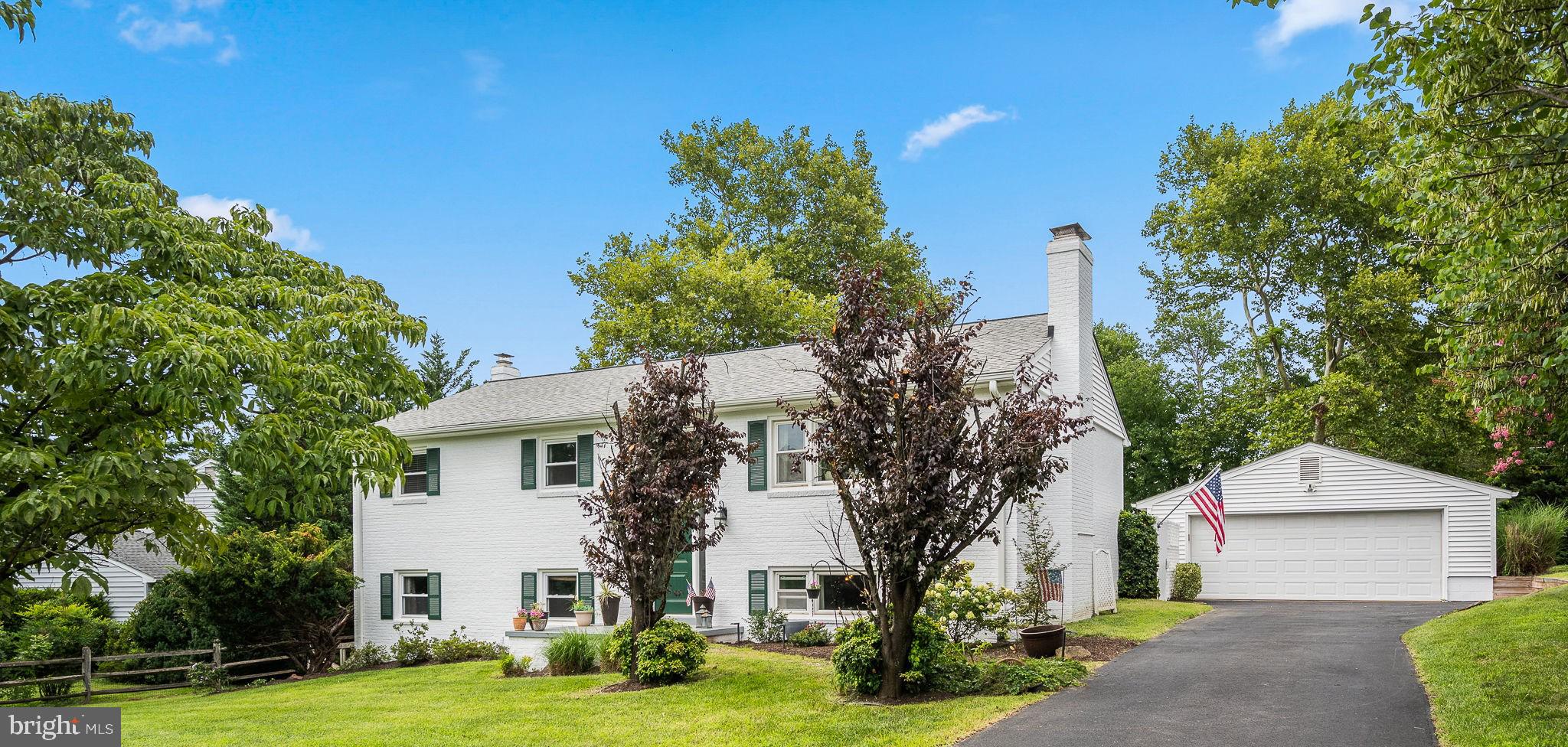 Opportunities like this don't come along often! Set on a picturesque ½-acre lot in the highly sought-after Oak Hill community, this beautifully maintained home offers the perfect combination of space, comfort, and an unbeatable location. Nestled beside Floris Elementary School, you'll appreciate the established neighborhood, mature trees, and generous yard that are increasingly hard to find.

Inside, the light-filled main level features an inviting open-concept design that's ideal for both everyday living and entertaining. The updated kitchen flows seamlessly into the spacious dining area and welcoming family room, creating the heart of the home. Three generously sized bedrooms and two full bathrooms complete the main level.

The finished lower level provides exceptional flexibility with a second family room, two additional bedrooms, and a full bath that is perfect for guests, multigenerational living, a home office or recreation space. A custom-built bar adds a unique gathering spot.

Step outside to enjoy the expansive deck and patio overlooking the private backyard, offering plenty of room for outdoor dining, relaxing, gardening, or hosting family and friends. The oversized detached two-car garage provides abundant space for vehicles, hobbies, storage, or a workshop.

Conveniently located, you'll enjoy quick access to the Dulles Toll Road (Route 267), Route 28, Fairfax County Parkway, Dulles International Airport, and the Innovation Center Metro Station. Everyday conveniences are just minutes away, including shopping and dining at Reston Town Center, Franklin Farm Village Center, Worldgate Centre, and a wide variety of grocery stores, restaurants, parks, and entertainment options.

This is a rare chance to own a spacious home on a generous lot in one of Herndon's most desirable locations, offering the perfect blend of privacy, convenience, and timeless appeal.