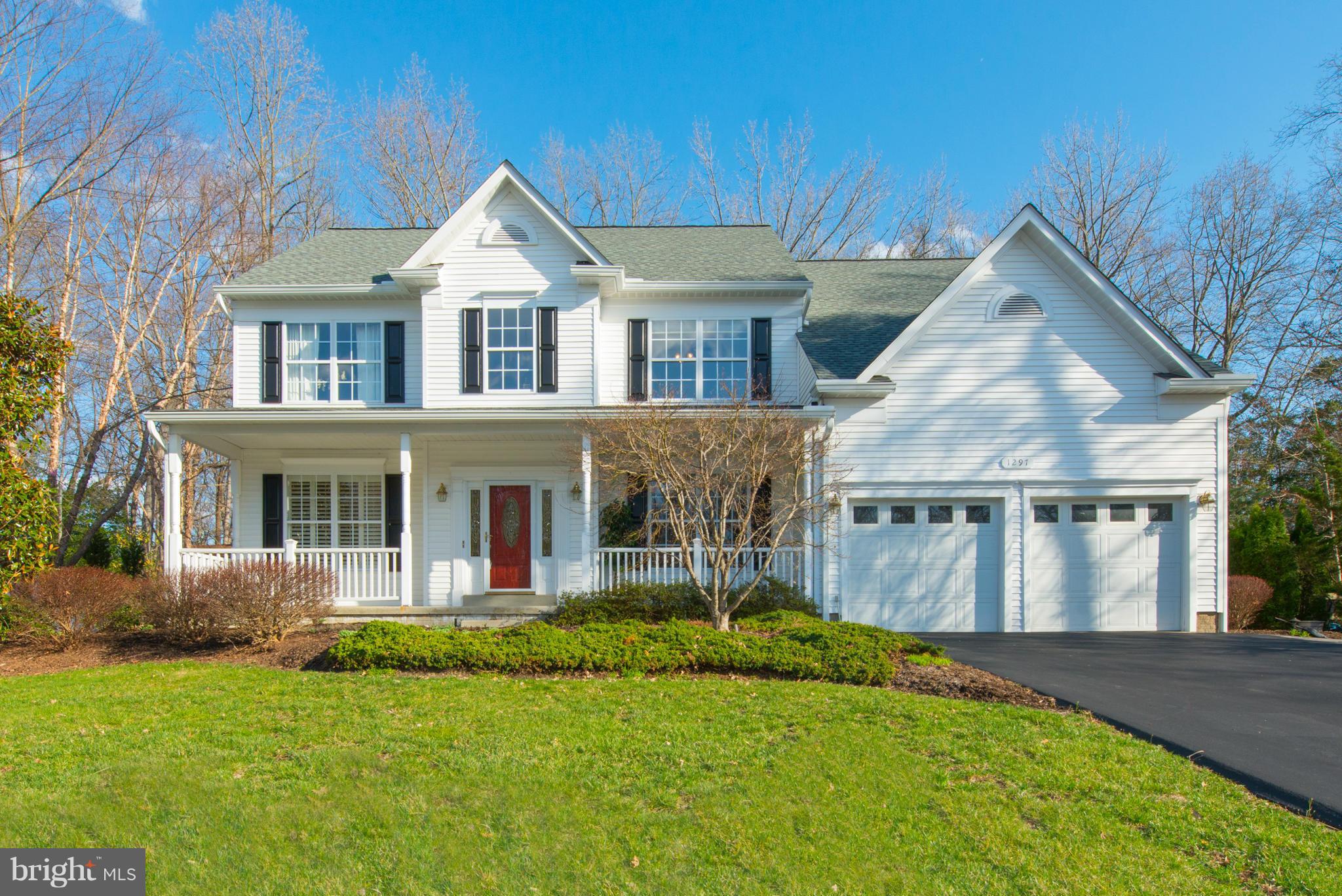 Vacation from home in this stunning colonial w/ private oasis in the back yard.  Walls of windows over looking pool w/ 7 waterfalls, gazebo, outdoor fireplace, custom stone work and more.  Craftsmanship and pride of ownership shine through.  Over $400K in renovations over the past 15 years.  Custom kitchens & baths, hardwood floors, open floor plan, bright, neutral colors throughout.  Welcome home