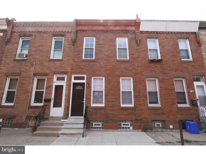 This is an absolutely stunning 2 story brick front 2 bedroom home. A must see in up-and-coming Port Richmond ! Enter into a modern and spacious open floor plan and you will be greeted by pristine hard wood floors and recessed lighting. There is plenty of space for a living and dining room set in this space. The walls throughout have been professionally painted and look like new construction. The large eat in kitchen is spectacular with light tile floors paired perfectly with glass subway tile back splash, handsome cabinetry, granite counters and stainless appliances. There is a huge rear yard with a raised brick green space, expertly landscaped. The full unfinished basement is meticulous, painted, has washer and dryer and there is ample space for storage. The 2nd floor has 2 large bedrooms with ample closet space, filled with natural light and a modern hall bath. The bathroom is completely designed with a contemporary flair with an inlay int he shower for toiletries, and a storage vanity.  We welcome your visit.