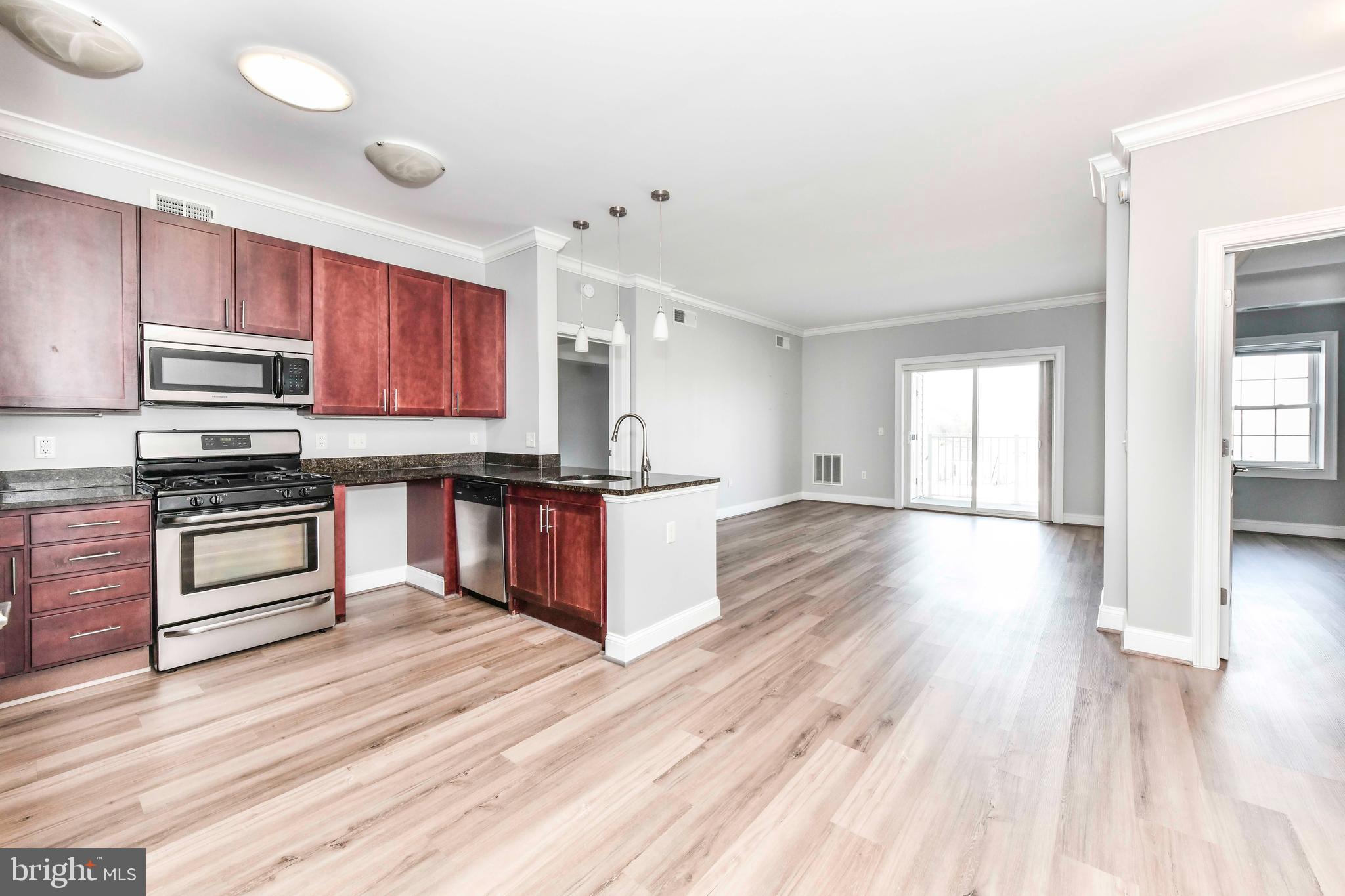 Check Out The Virtual Tour Here: https://homevisit.view.property/2306518?a=1&pws=1

Welcome to The Isabella 610, a top-level 2BR/2BA condo in an fantastic community of professionals and families. Bright and spacious, with 9+ foot vaulted ceiling and five solar tubes that provide ample natural sunlight all day. Top floor allows for a quiet environment, fresh breeze, and expansive balcony and window views across the roofs of the neighborhood to the trees of Bren Mar Park. 

Horseshoe kitchen with extensive counter space, gas range, under-cabinet lighting. Two spacious bedrooms separated by the living room are ideal for multiple family members, hosting guests or home office. Both bedrooms include roomy walk-in closets for gear and home storage. Spacious marble bathrooms, with one that features an additional standing shower perfect for humans or pups! Pet-friendly community. Two parking spaces and three indoor storage lockers. Amenities include access to two pools (private Isabella building pool and members-only Bren Mar Community Pool), freshly painted fitness center with cardio, exercise machines, cable and free weights; freshly painted community room with TV, kitchen, and communal board games; ample access-controlled guest parking; private gated dog run and dog walk areas; basketball and tennis/pickleball courts; professional-grade grills; free daily shuttle service to Van Dorn metro station (6 min away); year-round community events; and robust security features including fob-controlled outdoor and indoor parking lots, and fob-controlled entry. 

This condo also includes fabulous ADA accessibility for any generation – multiple elevators, wider doorways, maneuverability, no thresholds, support bars and handheld shower, automatic doors at building entry, and pool lift. Fairfax County schools. Multiple nearby parks, trails, playgrounds are easy to walk to. Super convenient to grocery stores, restaurants, and 95, 395, and 495. 20 minutes to DC, Tysons Corner, National Harbor, Springfield Town Center, and Old Town. 

An incomparable condo in a fabulous community! Agents check the listing documents for new updates happening NOW at The Isabella!