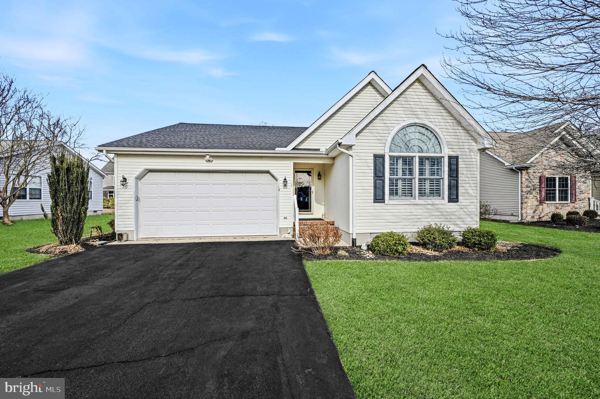 Discover the perfect single-story home in a low HOA community, minutes from Rehoboth, Lewes, and Dewey Beaches! This beautifully maintained residence, just under 1400 sq feet, features 3 bedrooms, 2 bathrooms, and a  garage with epoxy floors and insulated walls. A new roof and HVAC system had been updated just over 2 years ago—offering peace of mind .
Designed for easy living and entertaining, the home features an open concept layout that incorporates a ​large kitchen with ample cabinet and counter space. Gleaming hardwood floors flow throughout, accentuated by abundant natural light through custom shutters, creating a warm and inviting atmosphere.
The primary bedroom boasts a deep closet which will meet all your storage needs. Two additional bedrooms, situated on the opposite side of the home, provide perfect space for family, guests, or a home office.
Enjoy outdoor living at its best with a generous rear composite deck, complete with a retractable awning for shade and relaxation. The fully fenced backyard offers security for pets and children. Plus, the encapsulated crawl space enhances the home's energy efficiency.
Located in an unbeatable spot, this home gives you easy access to pristine beaches, lively nightlife, boating, scenic biking trails, and nearby state parks. Whether you're surfing, fishing, paddling, or exploring fantastic local dining and shopping, there’s no shortage of ways to enjoy beach life.
