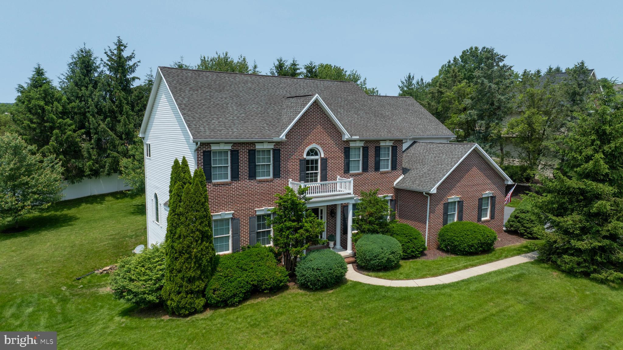 Welcome to this custom-built home in the Highlands neighborhood! Just minutes from Penn State Hampden and UPMC West Shore, located in the top-rated Cumberland Valley School District, this 4,526 sq ft home features an enhanced  finished basement (1,110 sq ft) with full wet bar, full bathroom, and large amount of storage, ideal for entertaining and movie nights. Thoughtfully designed for refined entertaining and comfortable everyday living, this custom built, one‑owner home features a versatile layout, sophisticated finishes, and extensive upgrades throughout. The main level welcomes you with rich architectural details including upgraded wainscoting, crown molding, hardwood floors, and abundant natural light.
The formal living room offers a gas fireplace and an inviting, elegant setting. The formal dining room showcases a striking palladium window with custom millwork, flooding the space with natural light and scenic views. Both rooms feature glass doors that enhance character while providing privacy when entertaining.
At the heart of the home, the renovated chef’s kitchen impresses with upgraded granite countertops, enhanced tile finishes, and quality appliances including a double oven, induction cooktop, and French door refrigerator. A bright breakfast area with a built‑in dry bar and wine storage flows seamlessly into the spacious family room, which features another gas fireplace, hardwood floors, and direct access to the outdoor deck. A beautiful office with French doors and custom trim provides an ideal workspace or flexible-use room.
The expanded utility/laundry area offers exceptional functionality with ample counter space, cabinetry, sink, and organizational storage—doubling as a butler’s pantry when entertaining.
The fully finished three‑car garage features drywall, painted flooring, and space for play or projects when vehicles are removed. It also enjoys one of the most convenient school bus stops in the CV district, just steps from the home.
Not your standard basement, the lower level offers 1,110 square feet of premium finished space with travertine tile, wainscoting, crown molding, recessed lighting, large windows, and double French walk‑out doors. A full bar and kitchen area with granite counters, island, appliances, and built‑ins make this level ideal for gatherings, game days, or a quiet retreat. A full tub/shower bath adds flexibility. Two sets of double doors lead to 500+ square feet of storage. An upgraded Carrier system was recently added.
Upstairs, the spacious primary suite serves as a private retreat with elegant wainscoting, ceiling fan, and a luxurious en‑suite bath featuring marble tile, double vanities, soaking tub, stall shower, water closet, and a generous walk‑in closet. Four additional large bedrooms accommodate queen beds (two fit kings) and offer oversized closets with built‑ins. A Jack‑and‑Jill bath with dual vanities and a separate full hall bath provide excellent convenience.
Outdoor living includes over a half-acre of private, open yard space ideal for play, gardening, or future enhancements. A perennial herb garden adds charm, and the beloved tree house can be updated or removed at the buyer’s request.
The home features Andersen windows, Kohler fixtures, fresh neutral paint, and all‑metal zinc‑coated ductwork—beneficial for allergy‑sensitive occupants. The property has been meticulously maintained, smoke‑free, and pet‑free.
This exceptional location is steps from the scenic Beech Run Trail at Armitage Golf Club, with walking access to the course and dining. It is less than five minutes to major grocery stores and key highways including I‑81, 581, and the PA Turnpike. Carlisle Pike’s dining and shopping corridor is just 10 minutes away.
Experience the perfect balance of elegance, comfort, and convenience in this move‑in‑ready home, and buyer choice of carpet color to be installed prior to settlement. Schedule your private tour today!