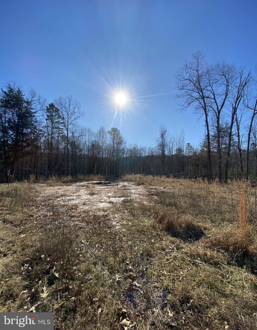 Rare opportunity to own a well-prepped 5-acre parcel on Firehouse Dr in Louisa County—offering a strong head start for your future home, investment build, or small compound.

This property has already undergone key improvements that significantly reduce upfront cost, time, and uncertainty for the next owner. A private driveway is installed, providing easy access into the homesite, and the lot has been partially cleared to open up usable space while still maintaining privacy and natural surroundings.

A major value-add is the existing installed well, eliminating one of the more expensive and time-consuming components of rural development. In addition, a foundation is already in place, suitable for a primary residence or potential ADU setup, giving flexibility for a variety of build strategies.

A creek runs through the property, adding natural character, privacy, and long-term appeal—ideal for a homesite with outdoor living in mind.

Whether you're looking to build your personal residence, create a weekend retreat, or secure land with meaningful improvements already completed, this property offers a compelling combination of infrastructure, usability, and setting.