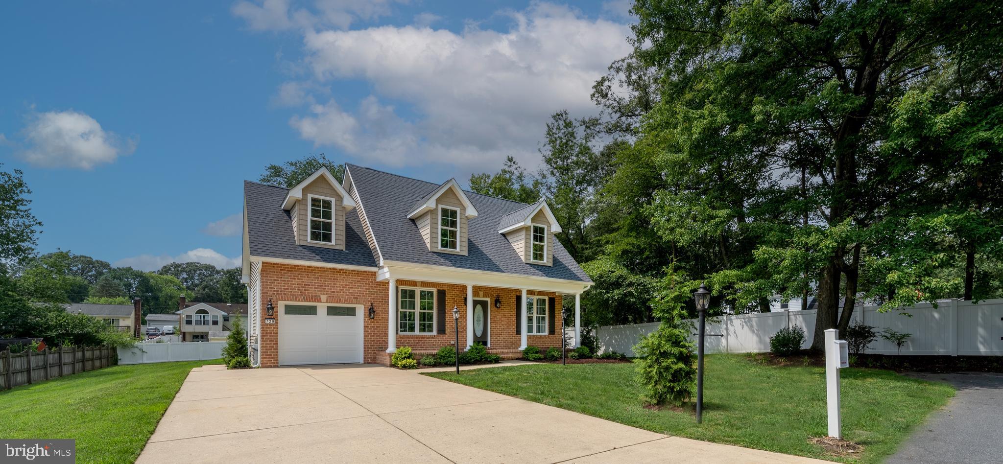 Unique, completely renovated, and move-in ready! Tucked away at the end of a quiet street in Severn, this like-new home has been beautifully updated from top to bottom and offers the perfect combination of modern comfort and low-maintenance living. Situated on a spacious 12,000-square-foot lot, the home welcomes you with a charming brick front, covered front porch, refreshed landscaping, and an oversized one-car garage with a two-car driveway. Inside, you'll find a bright, open living area, a beautifully updated kitchen with like-new appliances, two spacious bedrooms, and a fully renovated bathroom. Nearly every major component of the home has been replaced, including the roof, siding, windows, garage door and opener, plumbing, electrical system, HVAC, insulation, drywall, interior doors, flooring, tankless propane water heater, kitchen cabinets, bathroom fixtures, well tank, and water treatment system. The large rear patio overlooks an expansive backyard, creating the perfect setting for entertaining, grilling, or relaxing outdoors. Need extra storage? A floored attic with pull-down stair access provides abundant storage space. Whether you're a first-time homebuyer, looking to downsize, or simply searching for a home where all the work has already been done, this exceptional property is a rare opportunity. Why rent when you can own a beautifully renovated home that's ready for you to move right in?
