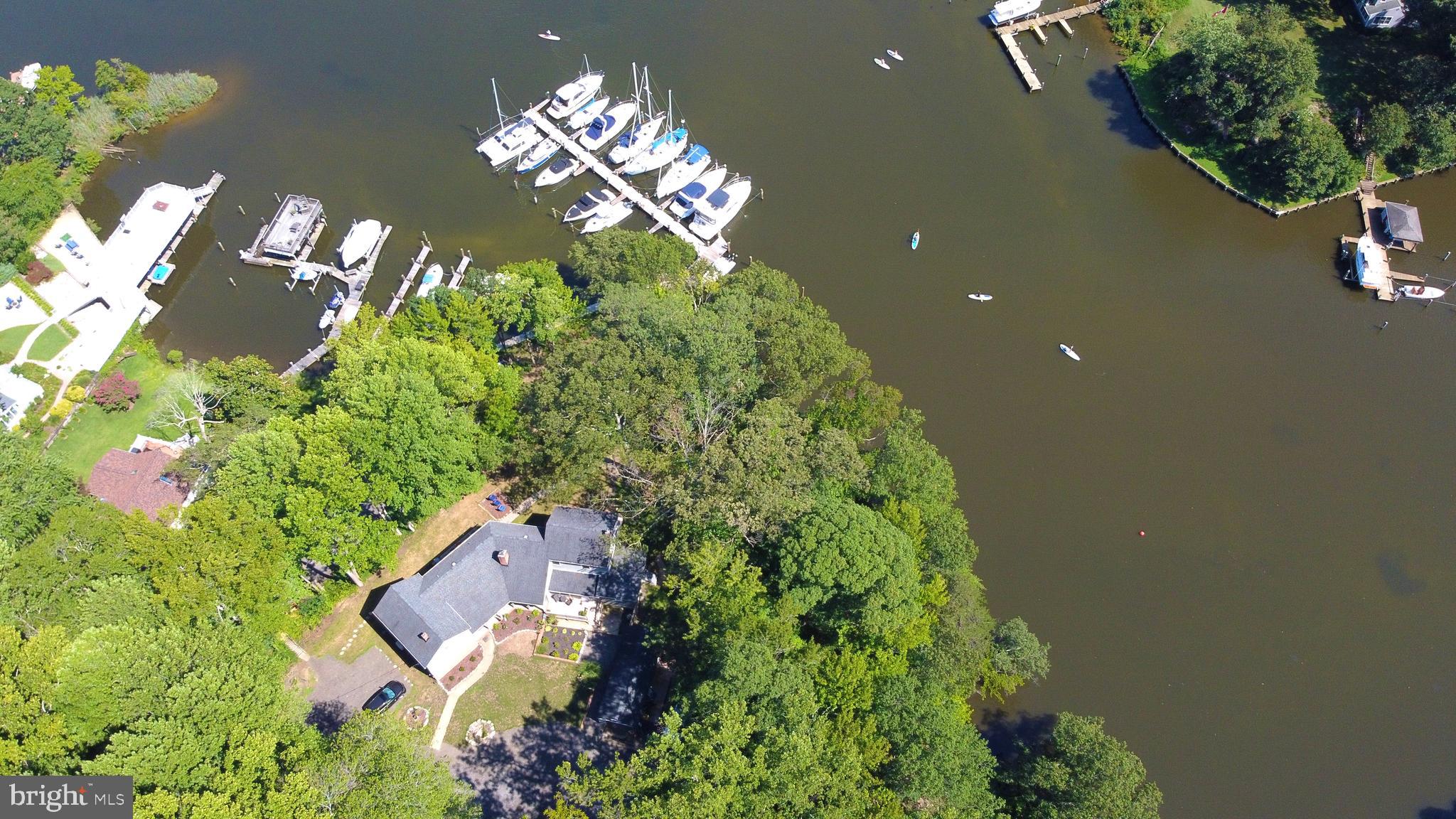 FOR COMP PURPOSES ONLY.  THIS PROPERTY WAS CO-LISTED WITH HYATT COMMERCIAL  Rare opportunity to own this private, boutique marina with 23 deep water slips updated residence and office, bath house, garage, vintage boat shed and plenty of parking.  Located at the end of a quiet street, yet convenient to shopping, bars, restaurants, Parole Town Center and downtown Annapolis.  And, ideally situated on Warehouse Creek, just off the South River and downstream from the Rt. 2 bridge, the marina and residence/office enjoys protected water, beautiful views and an ideal elevation.    The home/office is designed as two separate, and recently renovated, units with 2 kitchens, 3 bedrooms, 4.5 bathrooms, beautiful water views from nearly every room and upgrades throughout.   The marina features heavy upgrades to the pier and electric.  SHOWINGS BY APPOINTMENT ONLY.  PLEASE DO NOT DRIVE BY THE PROPERTY WITHOUT SCHEDULING AN APPOINTMENT.  FOR COMP PURPOSES.  PROPERTY IS CURRENTY UNDER CONTRACT WITH A COMMERCIAL BROKER.