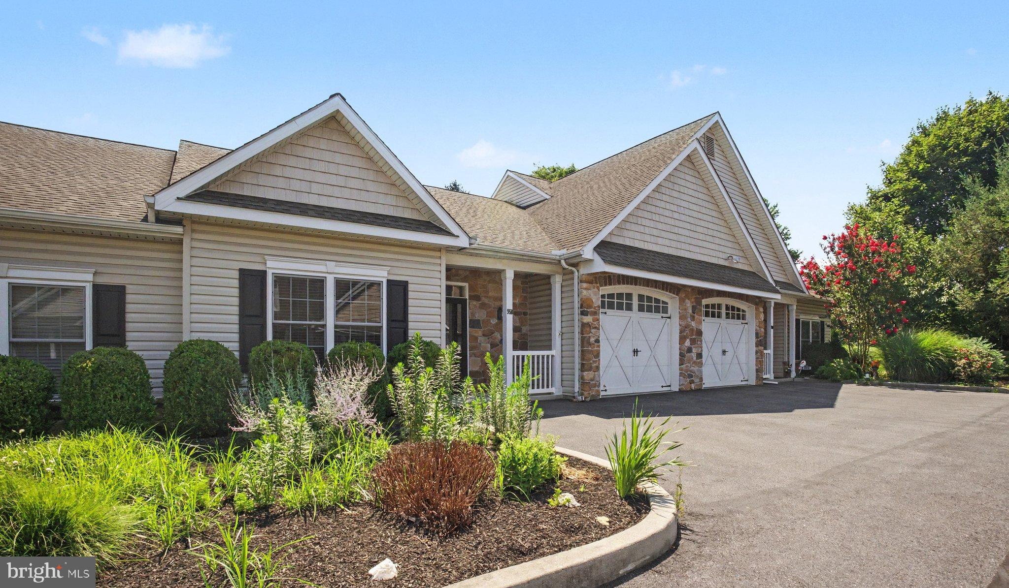 Rarely does an opportunity arise to own a home in the sought-after community of The Carriages on Elm. Offering the ease of single-level living, this beautifully maintained home features a spacious open floor plan with soaring ceilings that create a bright and inviting atmosphere. The gracious kitchen offers abundant cabinetry, a large breakfast bar, and opens seamlessly to the welcoming family room with a cozy gas fireplace—perfect for everyday living and entertaining. The spacious primary suite features a large walk-in closet and private ensuite bath, while the second bedroom, complete with its own walk-in closet, offers flexibility as a guest room or home office. A second full bath, convenient laundry room, and attached one-car garage complete the interior. Step outside to enjoy the private patio with awning, providing the perfect spot to relax or entertain. Ideally located just minutes from downtown shopping, parks, restaurants, and everyday conveniences, this home offers the perfect combination of comfort and accessibility. The monthly condo fee includes water, sewer, lawn care, snow removal, and exterior maintenance, allowing you to enjoy a truly low-maintenance lifestyle.  Agents please see the agent remarks for additional important information.