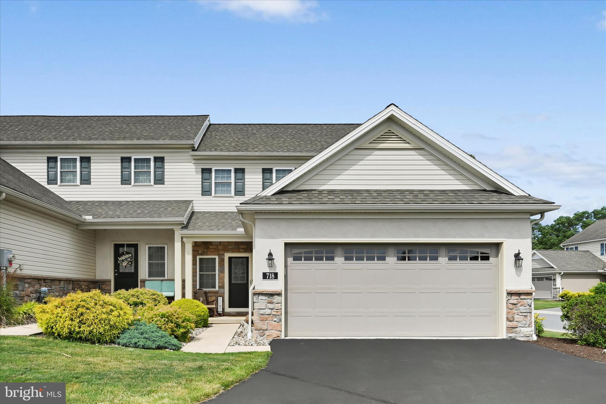 Enjoy easy living in Wood Edge, a quiet and well-maintained community featuring street lights, sidewalks, and walking trails. Conveniently located just minutes from shopping, dining, and major commuter routes, this home offers both comfort and accessibility. The open floor plan creates an inviting atmosphere, with the kitchen flowing seamlessly into the dining area and spacious living room highlighted by a cozy gas fireplace. The kitchen features a breakfast bar, stainless steel appliances, and a tile backsplash. Just off the main living area, the screened porch with a cathedral ceiling provides a wonderful space to relax, dine, or enjoy the outdoors in comfort. Situated on a desirable corner lot and end-unit location, the home benefits from abundant natural light and additional green space. The primary suite is conveniently located on the main level and includes a full bath and walk-in closet. A main-level laundry room adds to the ease of everyday living. Upstairs, a versatile loft provides flexible space for a home office, reading nook, or sitting area, along with two additional bedrooms and a full bath—perfect for family or guests. The finished lower level expands the living space with a generous recreation room featuring brand-new flooring. You'll also find a large storage area and durable Superior Walls construction. Additional highlights include a drywalled two-car garage with a utility sink and plenty of room for storage and projects. With flexible living spaces, thoughtful updates, and a convenient location, this home offers a comfortable setting for a variety of lifestyles.