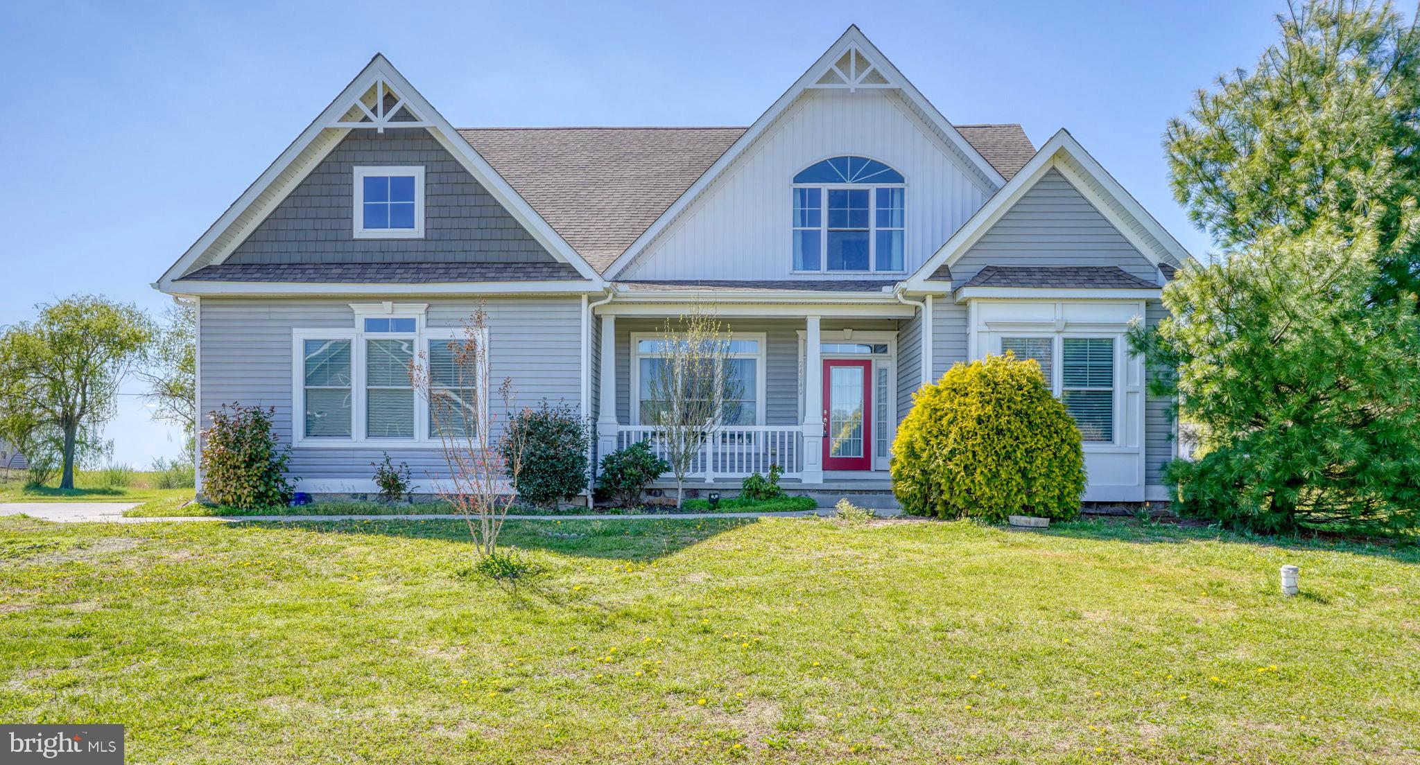 Welcome to this beautifully custom-built home located in the highly sought-after community of Black Creek Cove. This stunning 4–5 bedroom, 3-bathroom single-family residence offers approximately 3,500 square feet of thoughtfully designed living space across two expansive levels—perfect for both everyday living and entertaining.

Convenience is everything, with a short drive to the charming towns of Georgetown and Millsboro, where you can enjoy a variety of shopping, dining, and everyday amenities. Plus, you’re just about 30 minutes from Lewes and the Delaware beaches, making this an ideal location for beach lovers and weekend getaways.

From the moment you step inside, the home captures your attention with a formal dining room to the left and two spacious rooms to the right—perfect for guest rooms, a home office, or flexible living space. As you continue through, the chef’s kitchen becomes the heart of the home, featuring high-end appliances, sleek countertops, and ample cabinetry. The open floor plan seamlessly connects the kitchen to the main living areas, creating an ideal space for gathering and entertaining.

Natural light pours in through large windows and a custom bump-out, enhancing the bright and airy feel throughout the home and creating a warm, relaxing atmosphere.

The luxurious first-floor primary suite offers a private retreat, complete with a spacious layout, walk-in closet, and a spa-like en-suite bathroom featuring dual vanities and a soaking tub. Two additional first-floor bedrooms—or bonus spaces—provide flexibility for family, guests, or hobbies.

Upstairs, you’ll find two generously sized bedrooms, a full bathroom, and a versatile loft area that can be tailored to fit your lifestyle—whether as a media room, playroom, or additional living space.

Step outside to enjoy the expansive yard, perfect for summer barbecues, outdoor activities, or simply unwinding in a peaceful setting.

Don’t miss your chance to call this wonderful home your own—there’s truly so much to offer!