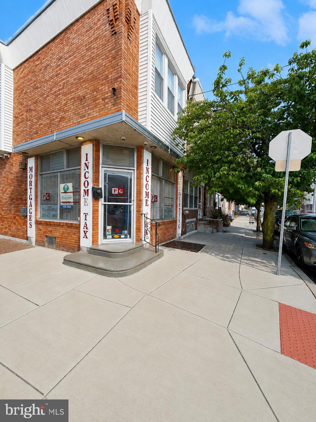 Large corner mixed-use property located in the highly desirable Port Richmond neighborhood. This versatile investment opportunity offers an ideal combination of commercial and residential space, making it well-suited for both owner-occupants and investors. The first floor features a spacious, open-concept professional services area with excellent visibility, a powder room, a kitchenette, and two additional private rooms that can accommodate a variety of business uses. Large street-facing windows provide abundant natural light and outstanding exposure for commercial operations. A separate rear entrance leads to the second-floor residential unit, which has been recently renovated and offers three bedrooms and one full bathroom. The apartment features a modern kitchen with white cabinetry, quartz countertops, stainless steel appliances, updated flooring, recessed lighting throughout, and a beautifully renovated hall bathroom. Conveniently situated in a prime Philadelphia location, the property offers easy access to public transportation, major roadways, shopping, dining, and recreational amenities. This mixed-use property presents a unique opportunity to own a dynamic, income-producing asset that seamlessly combines residential living and commercial functionality within a thriving urban community.