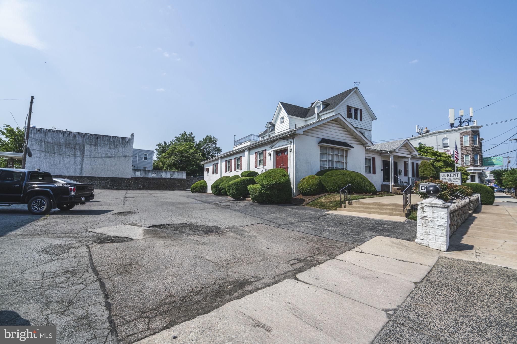 Enormous CMX2 zoned, corner property of more than 22,000 SF with 8340 SF building on site. The building contains a successful, operating Funeral Home and two apartments on the second and third floors. Large Parking Lot surrounding. Frontage on three different streets, including 120 ft of frontage on busy Haverford Ave. Potential development deal for 44+ Residential units (additional with available bonus) and 15k SF+ of Commercial. Unique opportunity for a funeral home operator or as a multifamily development deal.