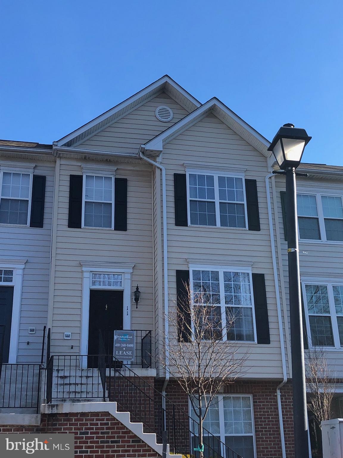 COMING SOON!!! Townhouse features dual primary suites to include private baths, cathedral ceilings, and LARGE walk-in closets! Gas fireplace in large eat-in kitchen with island, and private deck off of kitchen. NEW lighting throughout, NEW fridge and microwave, NEW flooring in kitchen and bathrooms. Ideally located close to Annapolis Mall, AAMC, all commuter routes and downtown Annapolis.