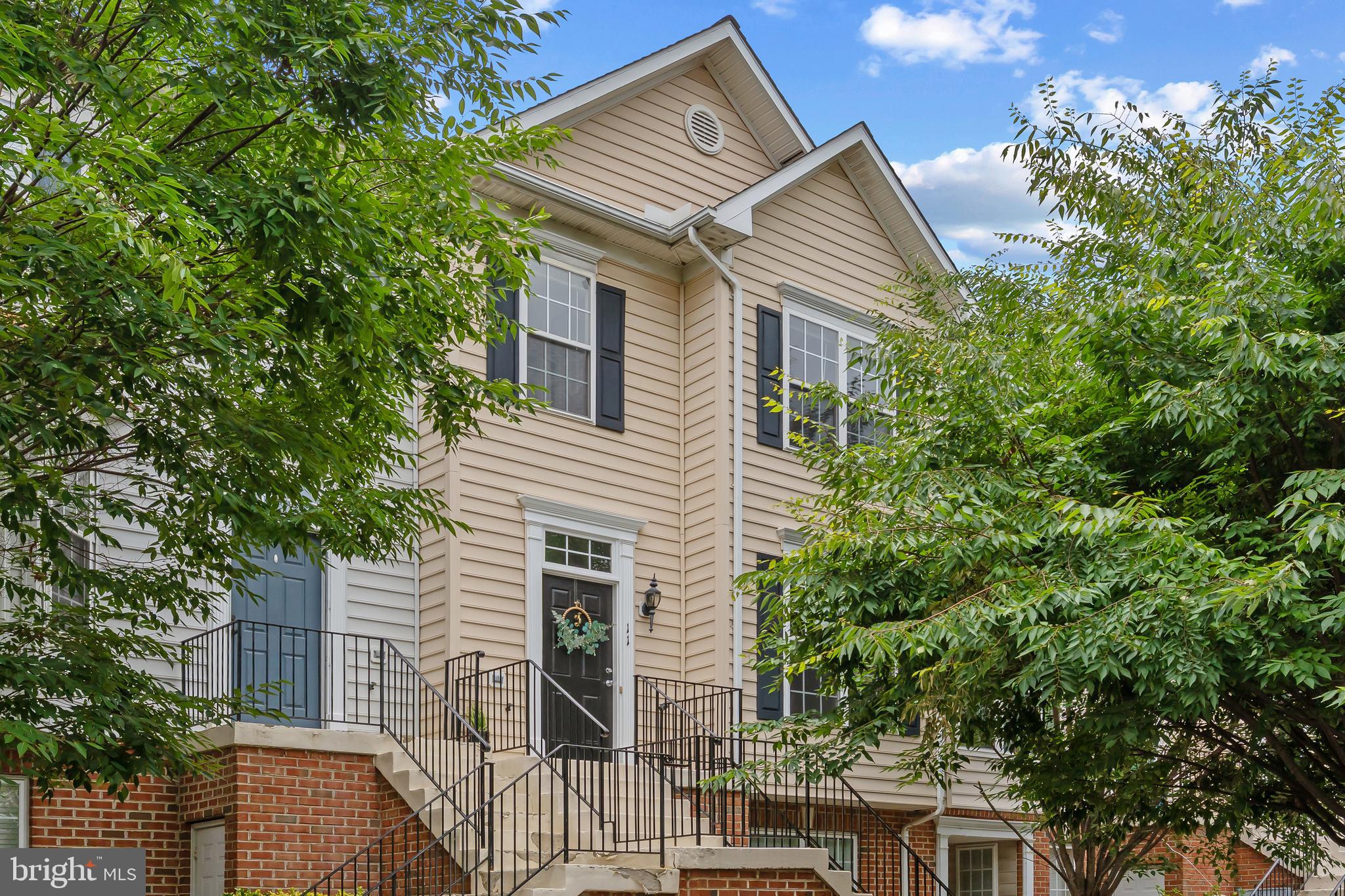 Unbeatable Annapolis location! This beautiful townhouse features dual primary suites with cathedral ceilings and large walk-in closets. Enjoy a large eat-in kitchen with a cozy gas fireplace, center island, and a private deck. Recent updates include NEW flooring in the kitchen/baths, NEW lighting throughout, and a NEW fridge and microwave.  Laundry located upstairs for convenience. Ideally located close to Downtown Annapolis, AAMC, shopping, and major commuter routes!