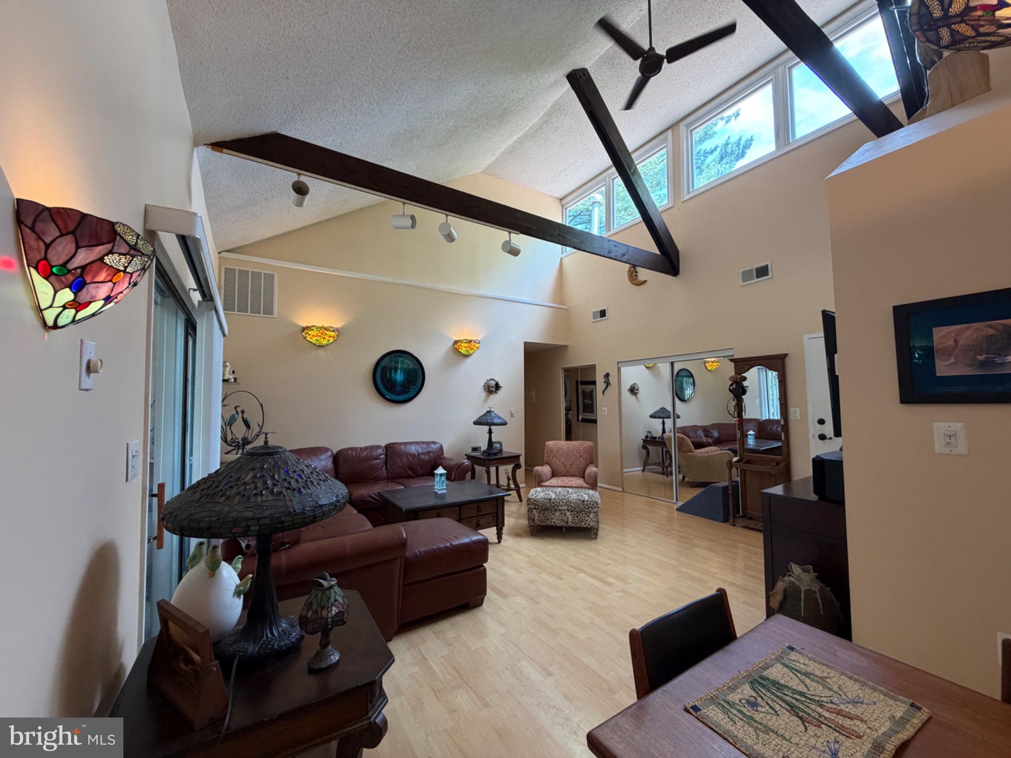 Outstanding top floor unit with cathedral ceilings, loft, windows for natural light. Gorgeous with private balcony. Rare 1 BR top floor unit in the community, only occasionally available.