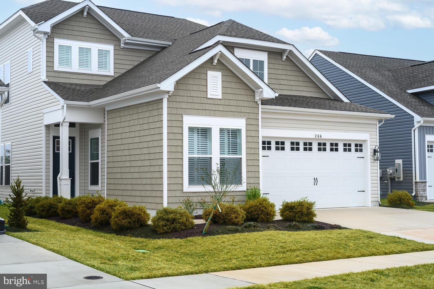 Huge Price Reduction on this beautiful, less than 1 year old home in the sought after community of Four Seasons at Kent Island.  This Simone model home with loft features 4 bedrooms and 3 full baths is awaiting it's next owner and priced well below the new construction models.  With recent improvements including paint and Plantation Shutters, this home is move in ready so that you can enjoy this community and the upcoming Spring and Summer on fabulous Kent Island.
Situated on a premium lot with close proximity to the 24,000 sq. ft. club house, indoor and outdoor pools, you won't be disappointed in touring this home.
The gourmet kitchen with the "Farmhouse Collection" design features stainless appliances including both a gas stove and built in wall oven to impress the most pampered chef with the oven and stove never used.  The master suite is beautifully designed with a master bath which includes a large walk-in shower, double vanity sink and large walk-in closet.  The 2nd bedroom and 2nd full bath are located on the main level and the 3rd and 4th bedrooms along with the 3rd full bath are located on the 2nd level.  As you pass through the main living area including the propane fireplace, you may eventually choose to relax on the rear screened patio to enjoy some of the outdoor living that the area offers.  This home also includes a Rinnai Tankless Water Heater.