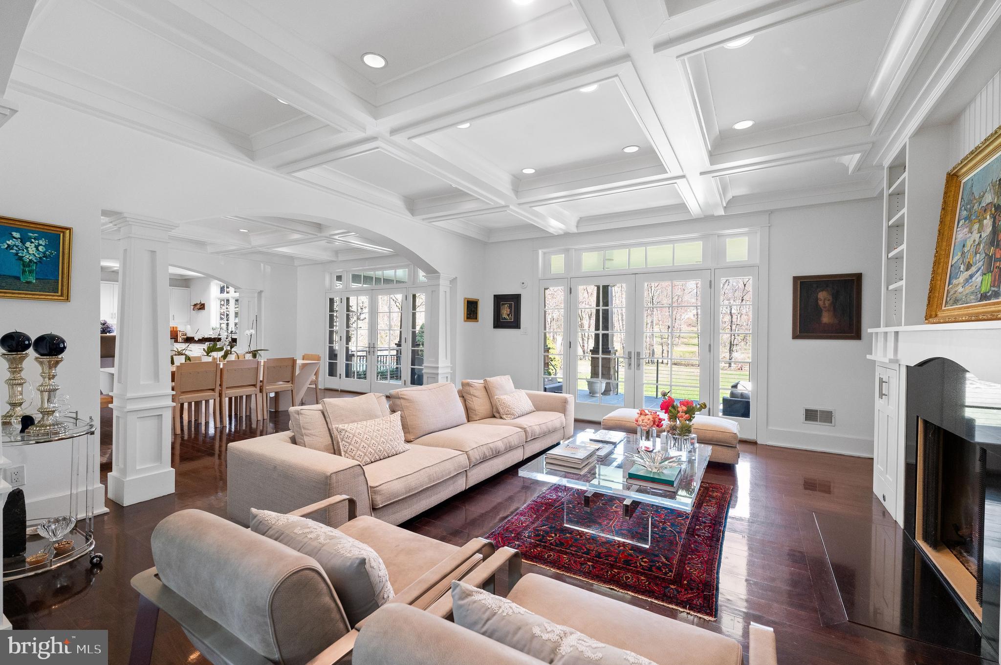 Welcome to your dream home – a masterfully designed 7,400 square foot cedar-sided Hamptons-style residence that exudes elegance and modern comfort. Built in 2006  in the tradition of noted architect Robert A. M. Stern and updated in 2016 by the current owners, this magnificent property sits on 1.66 acres in Bryn Mawr.  This 3 story, 6 bedroom, 7 and a half bath home is a harmonious blend of luxury, comfort, and state-of-the-art amenities, making it the epitome of upscale living. As you step into the grand foyer, you are greeted by a stunning staircase that sets the tone for the exquisite craftsmanship found throughout the home. Hand crafted archways and coffered ceilings create the perfect setting for entertaining. The first floor unfolds into a seamless flow of spaces including a sophisticated living room with gas fireplace and formal dining room completed with walls of French doors that open onto the stone patio overlooking the beautiful natural grounds. The bright chef's kitchen is equipped with top-of-the-line Sub Zero and Dacor appliances, butler's pantry and climate controlled wine room. The kitchen's beautiful built-in cabinetry and stunning woodwork extend throughout the first floor, enhancing the aesthetic appeal and functionality of the space. Adjacent to the main living area is a discreet staircase ascending to a cozy library and office/au pair suite with full bath, providing a private retreat within the home.  A striking glass-walled hall leads to the entertainment wing, a haven for leisure and enjoyment. Here, you'll find a breathtaking Art Deco tiered theater, offering an unparalleled cinematic experience. Adjoining the theater is a full service kitchen, full bath, and an expansive family room designed for ultimate comfort and style. The entertainment wing also boasts a second-floor gym. From the entertainment wing, you can enter the spectacular outdoor relaxation area, featuring a magnificent slate patio, a pool with a waterfall whirlpool, a stone fireplace, and a built-in grill– all set against the backdrop of meticulously landscaped grounds. The grand main staircase in the foyer leads to the second-floor accommodations, including a luxurious master suite overlooking the gracious grounds, with massive custom his and her closets, built-in cabinetry, and a marble radiant heated bath with a custom two-person glass walled shower and whirlpool tub. Three additional en-suite bedrooms and a laundry room complete the second floor, offering comfort and privacy for family and guests alike. The journey continues to the third floor, where two recently added additional bedrooms, a full bath, cedar closet, and extra storage space await, providing ample room for family or visiting guests.  This home is equipped with advanced technology for both convenience and security, including a Lutron lighting system, comprehensive house media system, whole house Generac generator, and five HVAC units. The property also features a large 3-car garage with built-in cabinets, ensuring ample space for vehicles and storage. Located on the prestigious Main Line, in the coveted Lower Merion School District, this home is not just a residence, but a lifestyle choice, offering luxury, privacy, and tranquility. Don't miss the opportunity to own this extraordinary home where every detail has been carefully crafted to ensure unparalleled elegance and comfort.