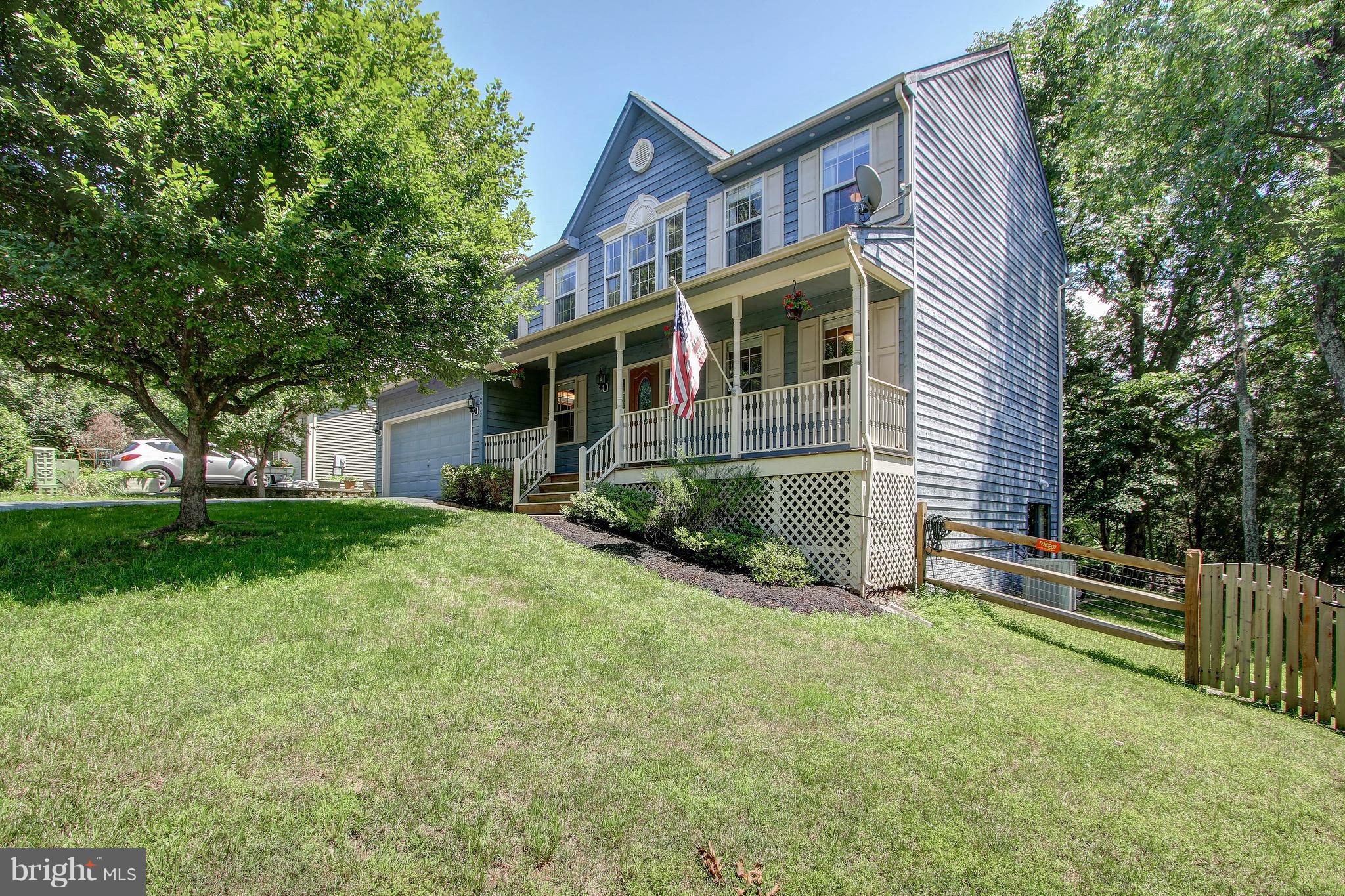 Remodeled and move in ready!! Recent kitchen renovation with beautiful cabinets, stainless steel and granite. Updated bathrooms with designer tiles and granite. Large master suite with vaulted ceilings, huge walk in closet and large master bath. Freshly painted through out, wood flooring and new carpet. Partially finished walk out basement to wooded backyard. Smartly priced for today's market.