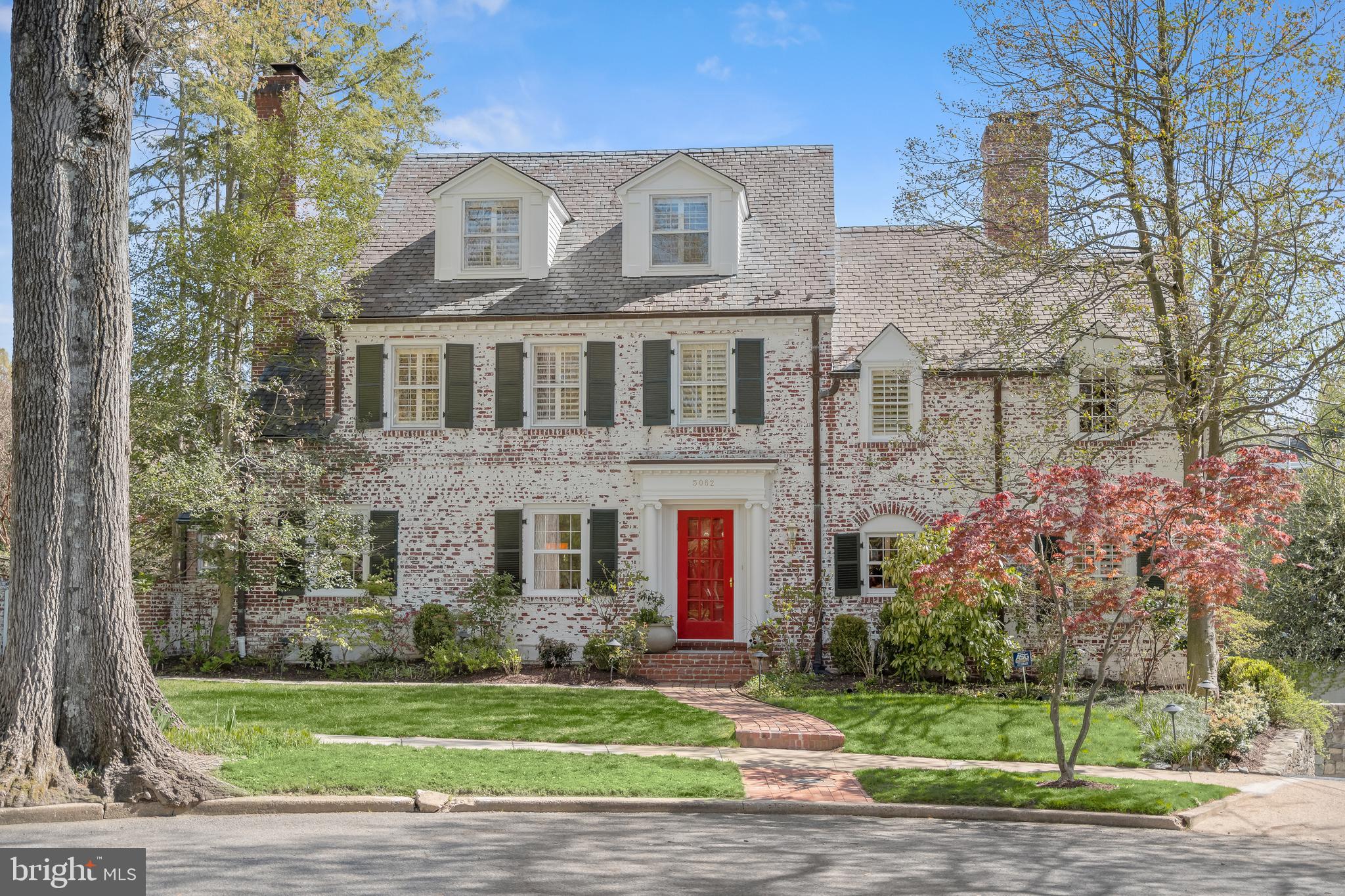 With its stately façade and striking curb appeal, this home exudes timeless elegance from the moment you arrive.  Previously renovated by Ankie Barnes and Richard Zantzinger, the home and property have been meticulously maintained and improved by the current owners.  The gracious living spaces strike a perfect balance between sophistication and comfort while offering an atmosphere of warmth and charm.  

Main level features a living room with detailed moldings and woodwork, a separate formal dining room, a chef’s kitchen that is as classic as it is beautiful, a delightful breakfast area, a family room with fireplace, and a sunroom that will become a favorite get-away.  There are multiple doors to the rear terrace, and the garden and heated pool below.  Details include random-width flooring, built-ins, archways, crown molding and charm throughout.  

The upper level includes the primary bedroom with a cathedral ceiling, wonderfully big windows, a large walk-in closet, and a beautiful en-suite bathroom, plus three additional bedrooms and two baths.  The architectural details, abundant natural light and thoughtful attention to detail make this level an ideal place for privacy, for rest and relaxation, and for simply enjoyment.   The third level is a perfect get-away for guests and family members of all ages and includes a private bedroom, a full bath and an extra sitting room.

The lower level has a recreation room with French doors to the terrace and pool.  In addition, there is a 6th bedroom with a fireplace and separate entrance.  The full bath works well for guests and with a door to the pool area, it is ideal for the swimmers.  Laundry, storage, and access to the garage complete this level.