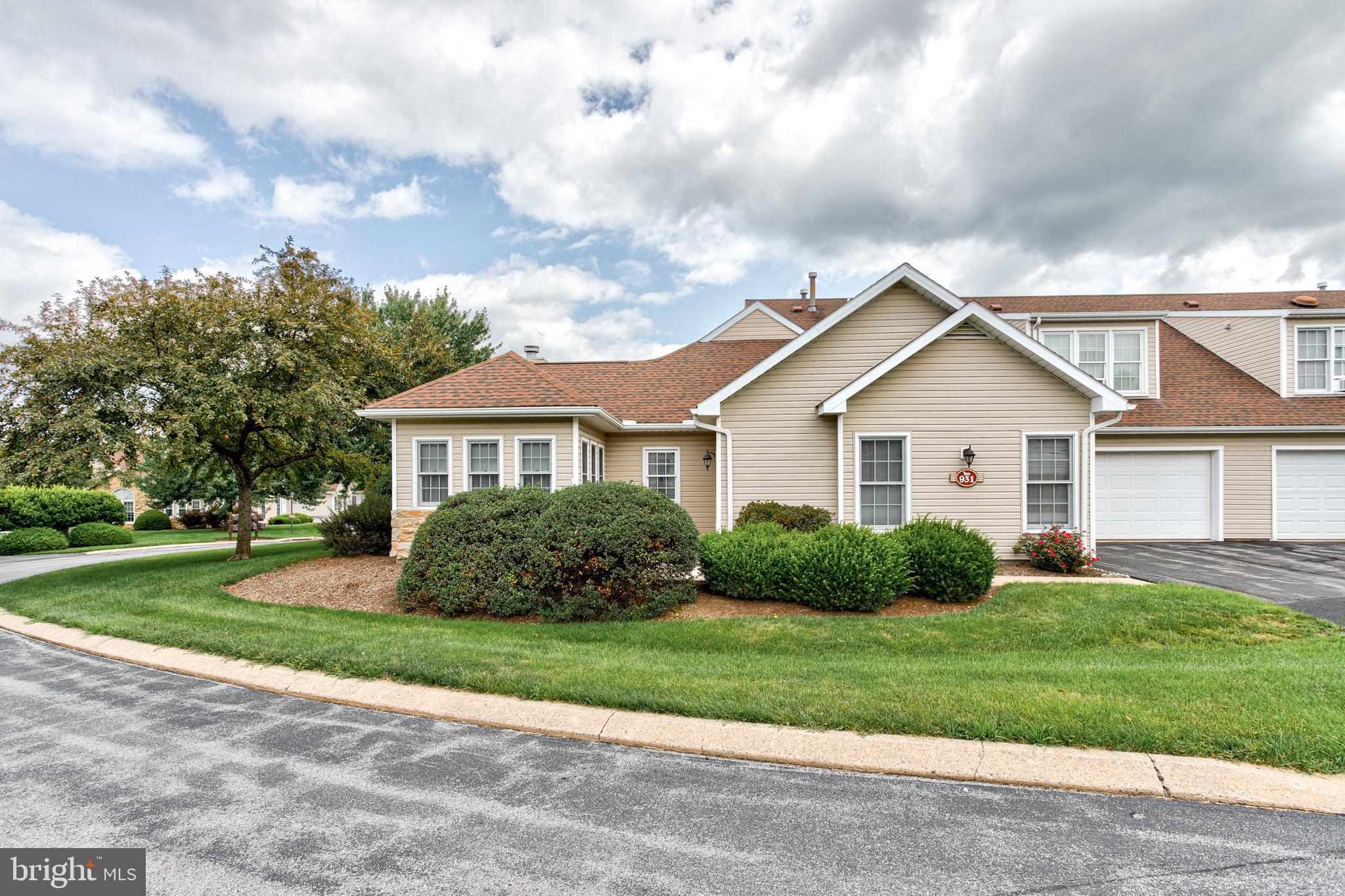 Enjoy one floor living in a delightful community.  Resting in proximity to PSU and amenities, this home invites you into an open kitchen living and dining room area. Taller windows and a vaulted ceiling open up the living room and lead you to French doors drawing you into a relaxing sunroom.  With a primary bedroom and en-suite bath, and an additional bedroom and bath on the main floor there is plenty of room to enjoy one floor living.  Yet you benefit from a second-floor bedroom and full bath for additional guests as well! With a new furnace installed in 2025 and added insulation in the attic areas, this is also a very efficient and comfortable home.  Just a short stroll from the unit you can enjoy the amenities of the club house including a fitness center, spacious gathering room and outdoor pool.  Come enjoy carefree living today!