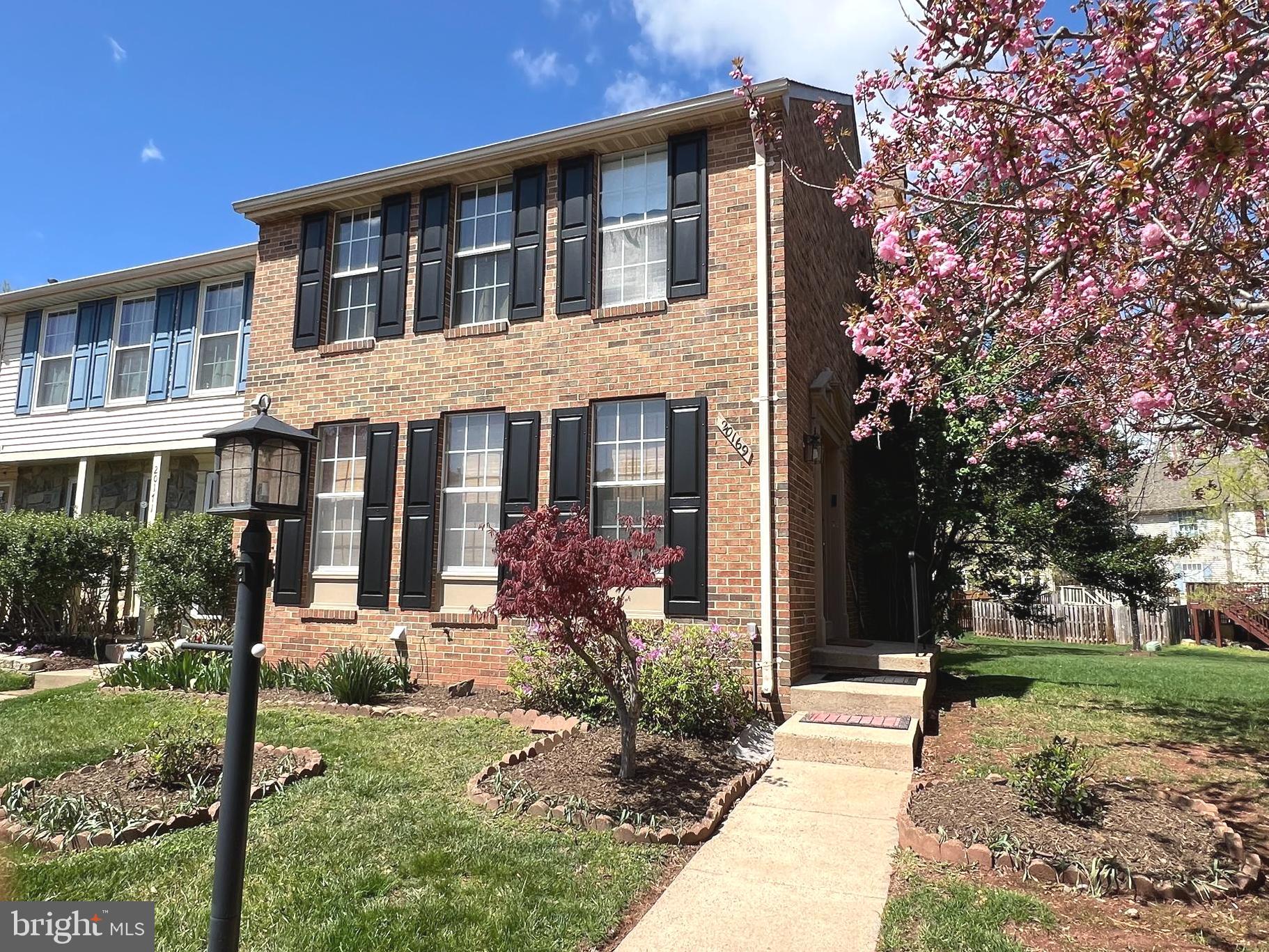 **Available to show. Accepting back up offers**Welcome to this beautiful brick end-unit townhouse, ideally located on a quiet cul-de-sac in the sought-after community of Ashburn Village. This charming home sits adjacent to a spacious common grassy area, giving the yard an expansive, open feel—perfect for outdoor play or relaxing with friends. With 3 bedrooms, 2 full bathrooms, and a convenient powder room on the main level, this home offers the perfect blend of function and comfort for modern living.

Step inside to find gleaming hardwood floors throughout the main level, a bright and inviting kitchen with granite countertops, and a cozy eat-in space. The open-concept living and dining areas flow seamlessly, highlighted by elegant French doors that lead to a fantastic screened-in porch—ideal for entertaining or unwinding after a long day. Upstairs, you'll find three well-sized bedrooms and a beautiful updated full bathroom. The primary bedroom features both his and her closets, including a spacious walk-in for all your storage needs. The attic is enormous with pull-down stairs; space you can walk around in and easily access everything you chose to store!

The finished walk-up basement adds even more living space with a generous rec room anchored by a classic masonry fireplace and mantel. A full bath with a jetted tub adds a touch of luxury—perfect for guests or a relaxing soak. Living in Ashburn Village means enjoying a lifestyle full of amenities, from indoor and outdoor pools to walking paths, tennis courts, playgrounds, and a fully equipped fitness center. You can even walk to one of the outdoor pools and enjoy lake access with a dock for fishing.

Located just minutes from Ashburn’s popular restaurants, coffee shops, and shopping options, this home offers the perfect mix of tranquility, community, and convenience being only minutes to the Metro and Dulles International Airport for easy commuting. Whether you're a young professional or a growing family, this is a place you’ll love to call home.
