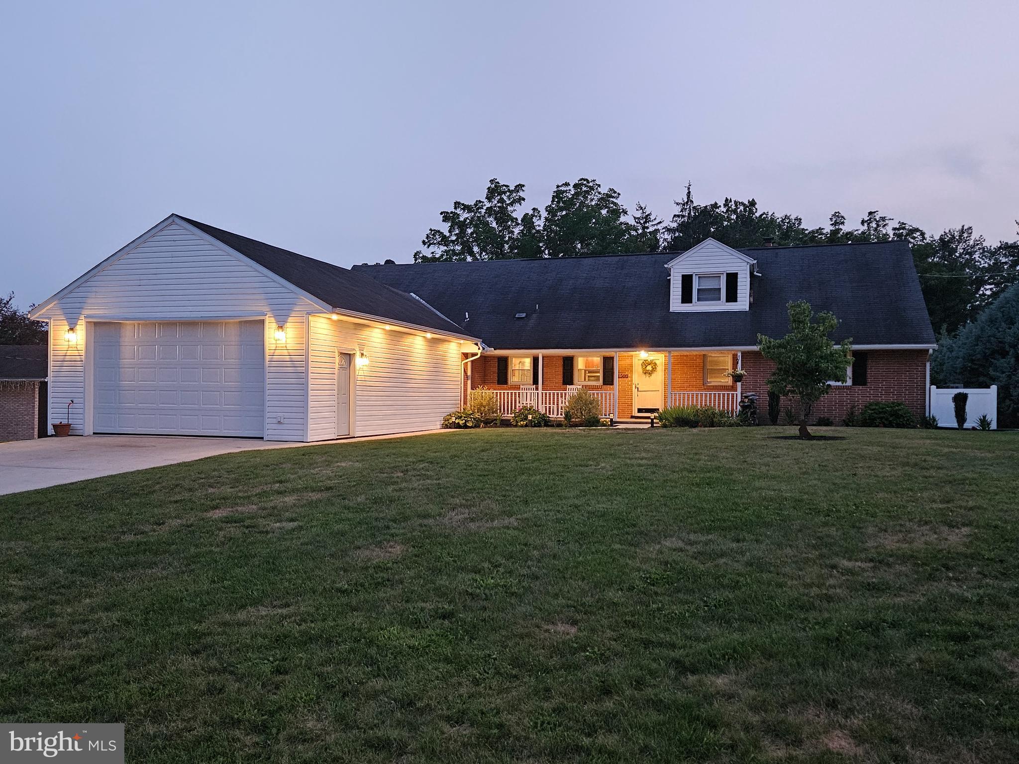 Welcome to Colonial Crest! This exceptional 5-bedroom, 3-full-bath Cape Cod offers the perfect combination of comfort, quality, and lifestyle in one of the area's most desirable neighborhoods.
Car enthusiasts and hobbyists will appreciate the incredible 1,265± square foot garage, complete with a 12'4" ceiling, insulated 16' x 9' overhead door, heating and cooling, and a two-post vehicle lift (which may convey). This is truly a dream workspace with room for multiple vehicles, projects, and storage.
The home features a versatile finished lower level with a spacious family room featuring a gas fireplace, kitchenette, full bath, and private bedroom, making it ideal for in-law quarters, extended family, guests, or a private retreat.
Step outside to your own private backyard oasis. Relax year-round beneath the 16' x 24' covered patio, unwind in the hot tub, cool off in the 16' x 36' heated saltwater sport-bottom swimming pool, gather around the fire pit, or simply enjoy the beautifully landscaped green space. A 12' x 20' metal storage building with two roll-up doors provides excellent additional storage.
Inside, the beautifully appointed kitchen features solid maple cabinetry, granite countertops, stainless steel appliances, an induction cooktop, double wall ovens, side-by-side refrigerator, and dishwasher.•