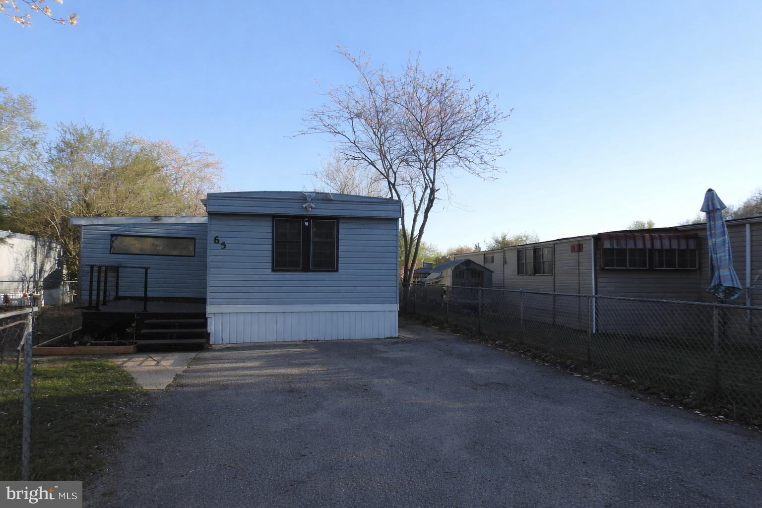 Buyer must be apply and approved by park management before closing. Ground rent applies, Buyer is responsible to verify all the info pertaining to the ground rent. All offers must include proof of funds for cash buyers or lender pre-approval from a mobile home–approved lender. Charming 3-bedroom, 2-bath mobile home offering comfortable living and a welcoming layout. The property includes a nice-sized yard ideal for relaxing or entertaining, plus a 2-car driveway for added convenience. Close to,Annapolis , Patuxent Wetland Park ,Captain Avery Museum,Honey’s Harvest Farm, Franklin Point State Park and much more.