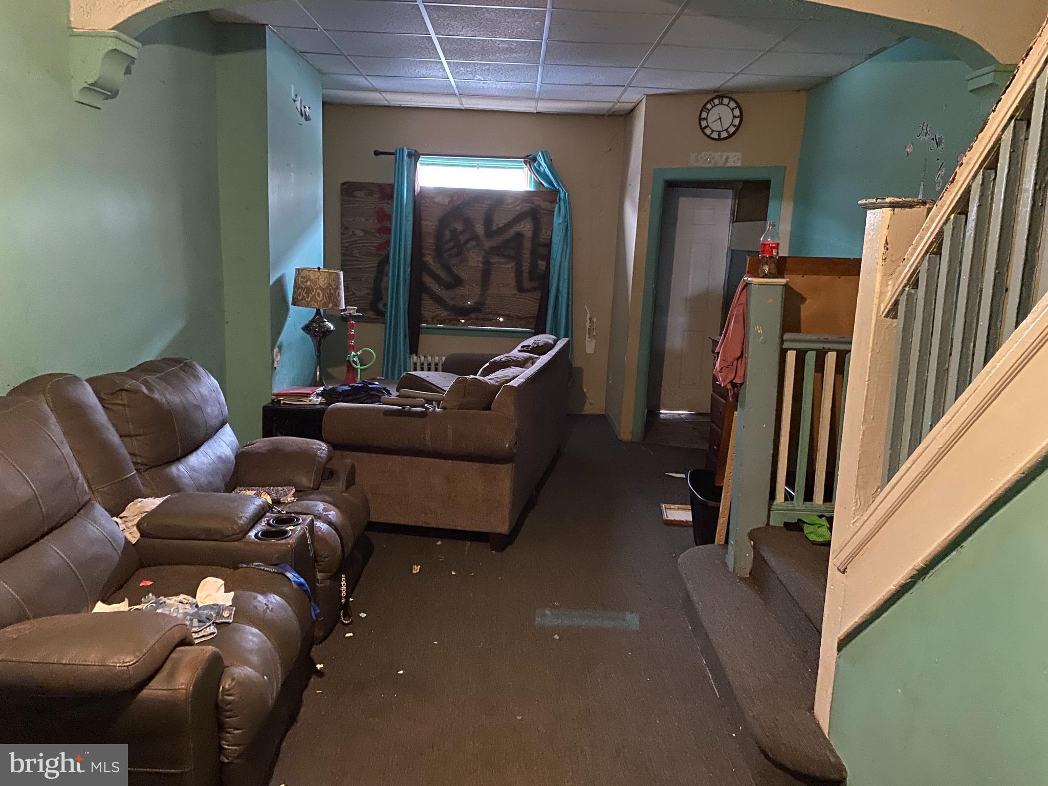 Good rental opportunity or starter home . property may or may not be cleaned out . Seller selling " as is "  .  Formal living room carpets , large dining room / kitchen combo .  Basement .  3 bedrooms upstairs  and hall bath . Close to bus stop and Allegheny ave .