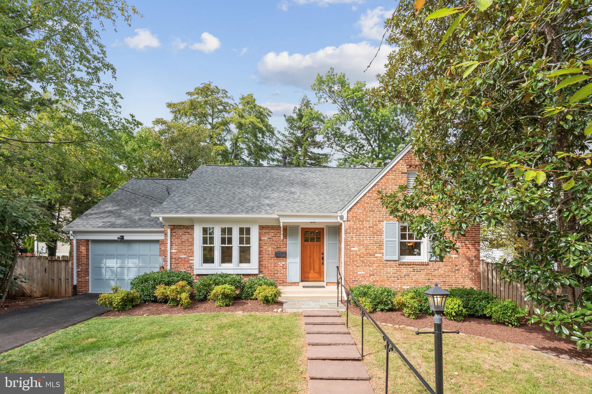 Large enchanting Cape Cod with four bedrooms, three full bathrooms, more than 3,000 square feet of finished living space, and located on a choice lot in one of Bethesda’s most coveted neighborhoods! This home is loaded with charm and character and enjoys many recent improvements including gorgeous refinished hardwood floors, new kitchen stove and gas cooktop, new barn door entry to primary bathroom, new primary bath shower doors, new plush carpeting in the lower level family room, new laundry sink, new washing machine, one-year old dryer, two-year old water heater, professionally painted interior and exterior, new driveway, one-year old roof, and beautiful refinished front door. Additionally, the owners added in 2016 an amazing screened-in-porch with almost 400 square feet that spans nearly the entire length of the home. The lower level was remodeled in 2013/2014 and includes a family room with gas fireplace, bedroom, full bathroom, and an office. The windows, interior doors, and door knobs/hardware were also replaced in 2013/2014. The kitchen and primary bathroom were completely remodeled in 2003 and have been upgraded and improved over the years. Many recessed lights have been added and most light fixtures replaced. The backyard is very pleasant, level, fenced, and has a flagstone patio and storage shed. Conveniently located to all three highly sought-after public schools, top notch private schools, Whittier Woods Local Park, and minutes to downtown Bethesda. You won't want to miss this very special and memorable home!