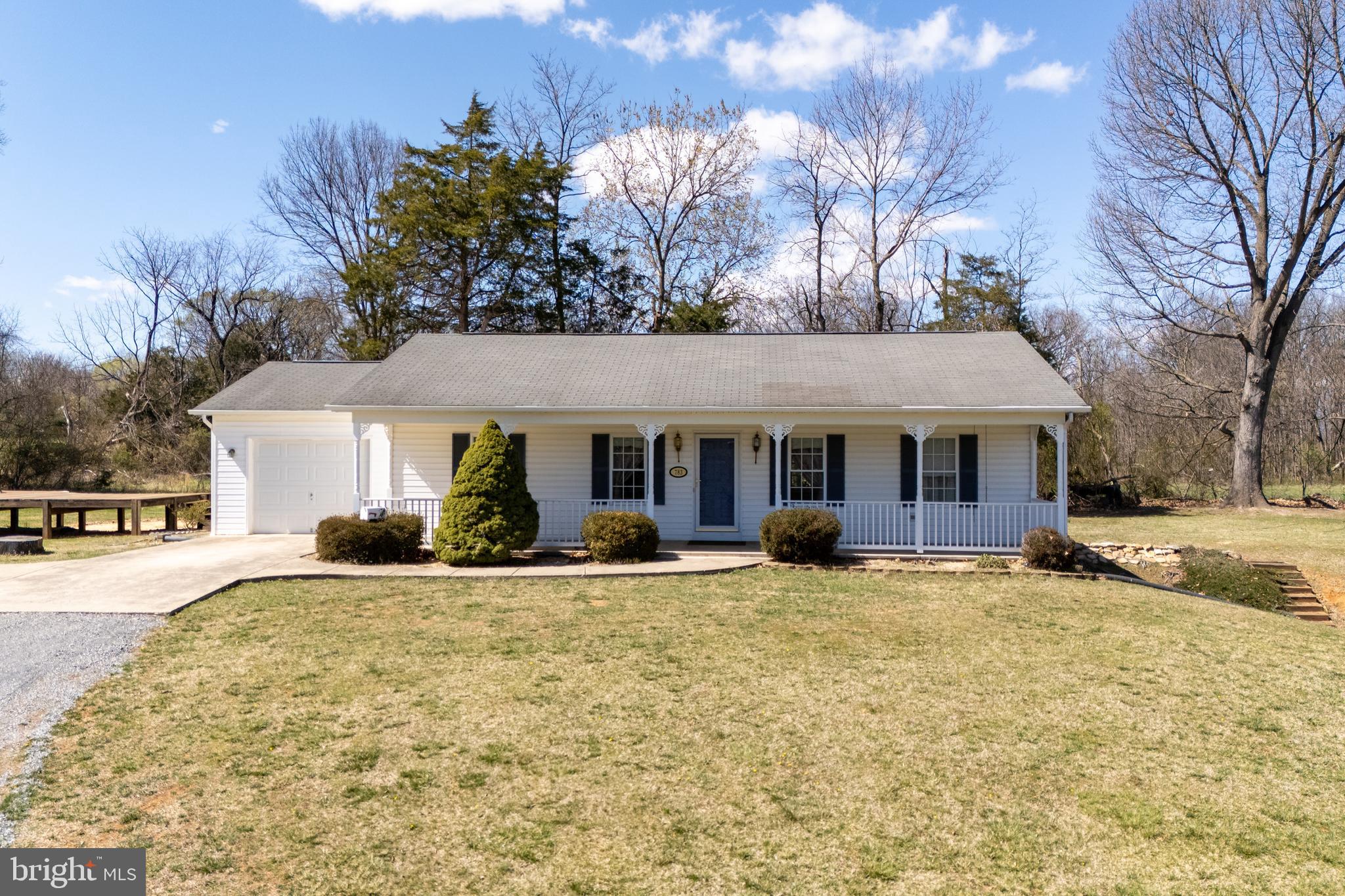 TRANQUILTY AND CONVENIENCE! In-town location with a Country atmosphere find this 3 bedroom, 3 bath ranch home on 4 plus acres with public water and sewer. Main level with kitchen, living/dining room, 2 bedrooms, 2 baths. Full walk out basement with outside entrance finished with kitchen, laundry, living room, office, bedroom and bath. Attached single car garage and driveway. Enjoy watching beautiful sunrises and sunsets from large front porch or rear deck, property offers best of both.