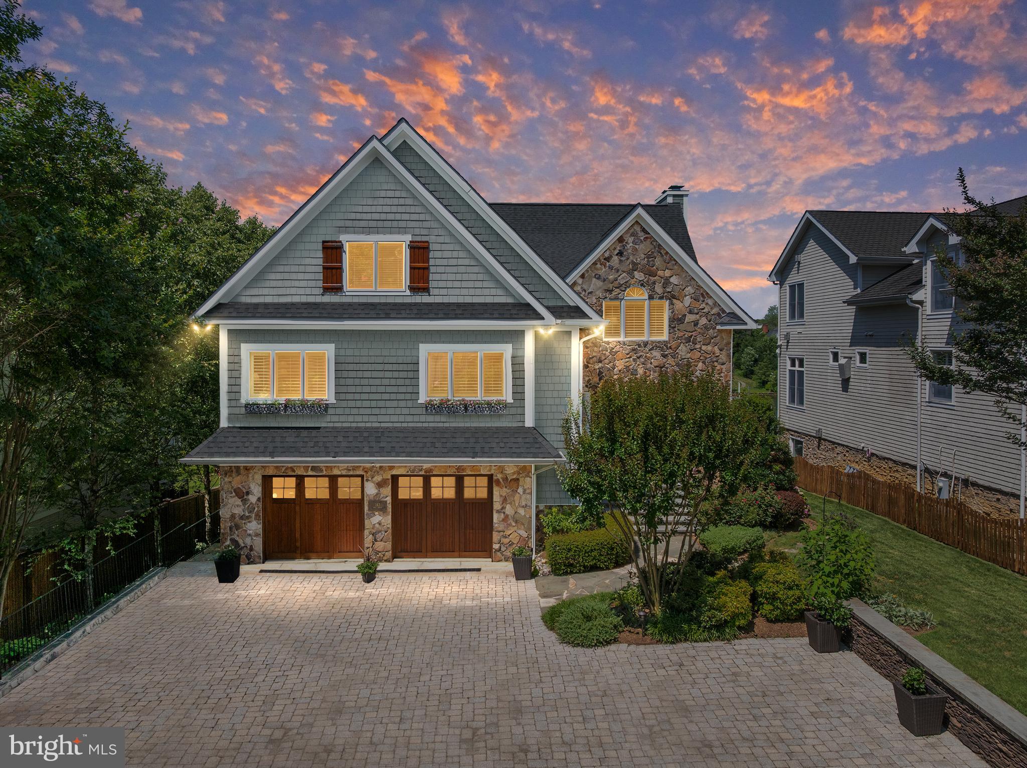 **Welcome to 143 Spa Drive – Your Exquisite Waterfront Retreat on Spa Creek!**

Experience the pinnacle of coastal living in this meticulously crafted custom home, where modern luxury harmonizes with the serene ambiance of waterfront life. Nestled alongside Spa Creek, this property offers unrivaled access to a variety of water activities, making it ideal for kayaking, paddle boarding, and leisurely boat cruises. As you step inside, you will be greeted by the breathtaking sight of the sun rising over the creek, illuminating the entire back of the home and welcoming you each morning with warmth and beauty.  

The open-concept layout is perfect for both entertaining and everyday living. At the heart of the home lies a gourmet kitchen that dreams are made of. Adorned with custom cabinetry, sleek quartz countertops, and a Calacatta marble backsplash, this culinary haven features premium appliances including Sub Zero, Bosch, KitchenAid, and Wolf, all complemented by a stylish custom hood. The oversized center island provides ample space for meal prep and casual dining.

Flowing effortlessly from the kitchen, the inviting Great Room is a perfect gathering spot, highlighted by a cozy gas fireplace and wet bar. French doors open onto a generous waterside deck, ideal for savoring the tranquil surroundings throughout the year and soaking in the beauty of Spa Creek.

Retreat to the luxurious primary suite, your personal oasis. This spacious sanctuary boasts soaring vaulted ceilings, a private balcony with sweeping views of the creek, and a second gas fireplace. The spa-inspired marble bathroom enhances relaxation with a double vanity, a Jacuzzi soaking tub, a frameless glass walk-in shower, and a separate water closet with a bidet. Two customized walk-in closets maximize storage and style.

On the opposite side of the primary suite, you’ll find a substantial executive office/den with custom woodwork, perfect for remote work or quiet contemplation. A separate level hosts two additional large bedrooms, each featuring individual three-piece baths, ensuring comfort and privacy for family and guests.

Convenience is key with both upper and lower laundry rooms to streamline daily tasks. The lower level offers approximately 1,500 square feet of versatile living space, including a bright walk-out family room with a third gas fireplace, a full gym, a fourth ensuite bedroom, and abundant storage options.

Outdoor enthusiasts will revel in the charming bluestone front porch, spacious rear deck and patio, and a thoughtfully designed expansive paver driveway providing generous parking, all surrounded by the stunning backdrop of nature and sculpted gardens.

Designed by the renowned architect Scott Rand, this custom home showcases exceptional quality, featuring 2x6 framing, Hardie Plank siding with elegant stone accents, and energy-efficient Andersen windows and french doors. Inside, detailed architectural millwork, hardwood floors, and vaulted ceilings coalesce to create a sophisticated atmosphere. The home is equipped with three heating and cooling zones, complemented by a 1,000-gallon propane tank to service the fireplaces, kitchen range, and two of the three HVAC units, and is conveniently piped for your outdoor grill.

Enjoy peace of mind with a home sprinkler system, generator, and security system. 

For the boating enthusiast, the property boasts a fully outfitted multi-slip pier, recently dredged to 20 feet in front of the pier and under each of the two boat lifts (12,000 lb and 3,000 lb), accommodating various types of watercraft. The pier also allows for personal Water Taxi pick-up, making travel to downtown Annapolis effortless.

Embrace the exclusive waterfront lifestyle that 143 Spa Drive offers. This immaculate home is not to be missed!