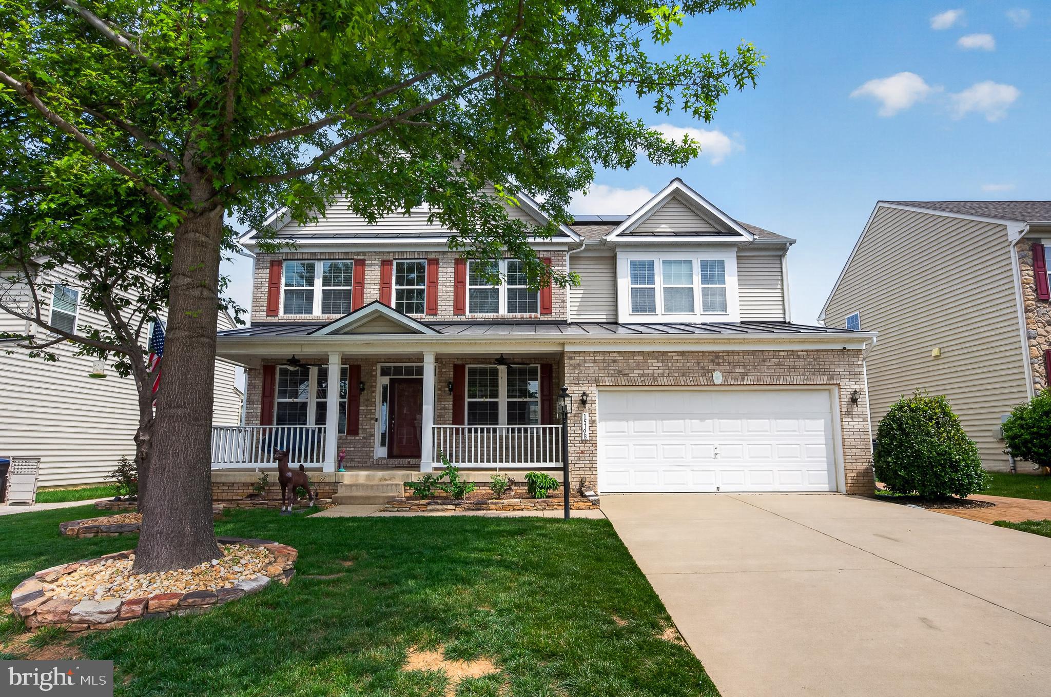 Welcome Home to Hope Hill Crossing!

Looking for a spacious home with room for everyone, high-end finishes, abundant natural light, and modern efficiency? This exceptional 5-bedroom, 3.5-bath home offers all that and more in the highly sought-after Hope Hill Crossing community.

One of the home's standout features is the 16-panel solar system installed in March 2025, providing outstanding energy savings with almost no electric bill, making this beautiful home as economical as it is impressive.

A deep, inviting front porch welcomes you into a dramatic two-story foyer, flanked by elegant formal living and dining rooms. The dining room showcases crown molding and wainscoting, creating the perfect setting for special gatherings.

The heart of the home is the expansive family room that flows seamlessly into the gourmet kitchen—a true chef's dream. Featuring granite countertops, upgraded cabinetry, under-cabinet lighting, stainless steel appliances, a gas cooktop, double ovens, a walk-in pantry, and a large center island, this space is designed for both everyday living and effortless entertaining. Just beyond, the sunroom offers a wall of windows that fills the space with natural light and provides access to the outdoor entertaining area.

The main level also includes a private home office, butler's pantry, and powder room.

Upstairs, the luxurious primary suite features a tray ceiling with crown molding, a spacious sitting area, custom closet, and a spa-inspired ensuite bath with dual granite vanities, soaking tub, separate shower, and private water closet. Three additional bedrooms, each with ceiling lights and/or fans, share a well-designed hall bath with a double vanity and separate bathing area. The conveniently located upper-level laundry room completes this floor.

The finished walk-up basement offers exceptional flexibility with a large recreation room, separate game room or office, legal fifth bedroom with a large closet, full bathroom, and approximately 300 square feet of additional storage space.

Recent upgrades include:

16-panel solar system (March 2025)
Roof replaced with upgraded shingles (2022)
Stamped concrete patio with built-in fire pit and composite stairs (2022)
In-ground irrigation system

Outdoor entertaining is effortless with the beautifully designed patio and fire pit, while the irrigation system helps maintain a lush lawn and attractive landscaping throughout the seasons.

Ideally located just minutes from shopping, dining, commuter lots, I-95, and excellent schools, this home also offers convenient access to three VRE stations, Old Town Manassas, Virginia Gateway, and Haymarket.

This beautifully maintained home combines luxury, space, efficiency, and location—an opportunity you won't want to miss. Schedule your private tour today!