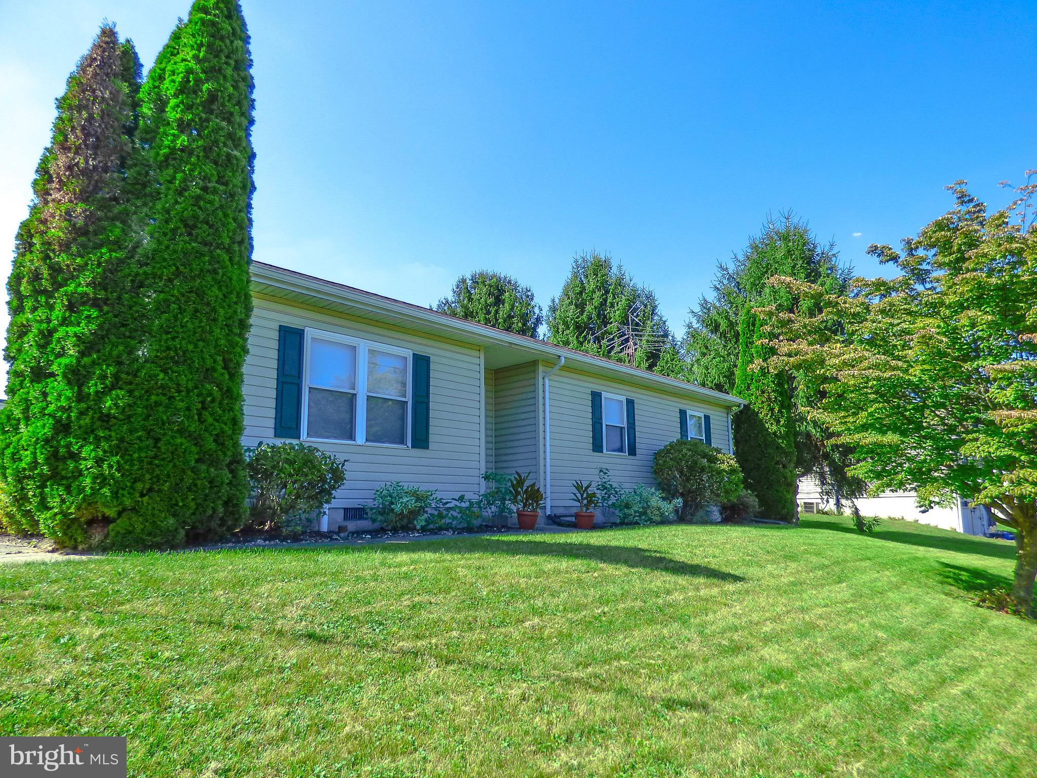 Great maintenance free rancher with wide hallways and wide doors - great for those with walkers or wheel chairs!  The kitchen is a large eat in kitchen with a smooth wood plank like water resistant vinyl floor.  This home has a large covered rear patio, plenty of off street parking, a large 11.5 x 19.5 shed with electric, ceiling fans and lights, hard wired ethernet cables and all appliances included with 2 window A/C units.  This rancher, corner lot home is neat, clean, neutral, in excellent condition and ready to move in.  This lot is on the curve of the street so it lives like a corner lot and an arched white vinyl privacy fence to the rear.  Hurry before you miss this great place on a quiet street in Felton!  Public water and water sewer too!  Pull down staircase to attic storage.