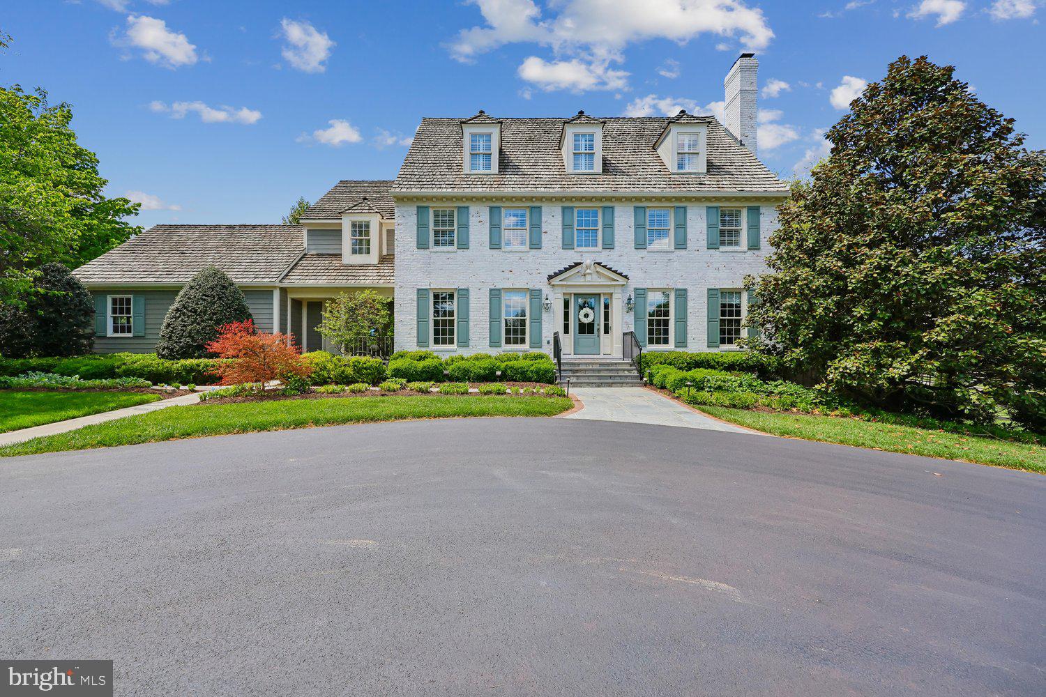 Located in the highly sought-after Belvedere community of North Potomac, this exceptional brick colonial offers over 6,500 square feet of refined living space. Thoughtfully expanded and extensively updated, combining timeless elegance with modern luxury. From the moment you enter the grand foyer, the home showcases exquisite craftsmanship, from detailed crown molding to gleaming hardwood floors. The fully remodeled kitchen and bathrooms reflect a sophisticated, magazine-quality design. The gourmet kitchen is the heart of the home, featuring a large island, quartz countertops, stainless steel appliances, double ovens and dishwashers, large pantry, a cozy fireplace and French doors that open to a beautifully landscaped patio—perfect for indoor-outdoor living.  A screened-in porch elevates outdoor living with ceiling-mounted heaters, a fan, gas fireplace, mounted TV, and built-in surround sound.   Entertain effortlessly in the formal dining room which connects to the kitchen with a butler’s pantry or relax in the inviting family room with its stone fireplace and wet bar. The main level also includes a charming living room with fireplace, a private study, an expansive back office/laundry/hobby room and two half baths, along with a welcoming front porch with secondary entrance.

Upstairs, the luxurious owner’s suite offers a private retreat with its own fireplace, sitting room, multiple spacious closets, and a stunning spa-inspired bathroom addition. The upper level continues with three additional bedrooms and 2 remodeled full baths, one en-suite and a dual-entry bath.  The third floor provides the fifth bedroom, a full bath plus a bonus room ideal for guests or flexible living. 

The walk-out lower level is designed for both relaxation and recreation, featuring a fifth fireplace, a kitchenette, home gym, full bathroom, and a large recreation area. Outside, the home truly shines with a private, professionally landscaped yard designed for both entertaining and tranquility. Enhancements include mature privacy plantings, extensive front and backyard landscaping and newly constructed circular driveway.  Exterior upgrades also include new slate steps and walkway, comprehensive lighting and landscape illumination,  fully fenced rear yard and a lime washed brick exterior for a fresh, modern aesthetic.

Completing the property is a two-car attached garage and a detached, garage/workshop with an unfinished second story and garden shed on the back, offering exceptional flexibility. Situated just moments from Muddy Branch parklands and trails, this home offers the perfect balance of suburban tranquility and convenience—only about 30 minutes from Washington, D.C.  For a full list of upgrades, see the disclosures.
