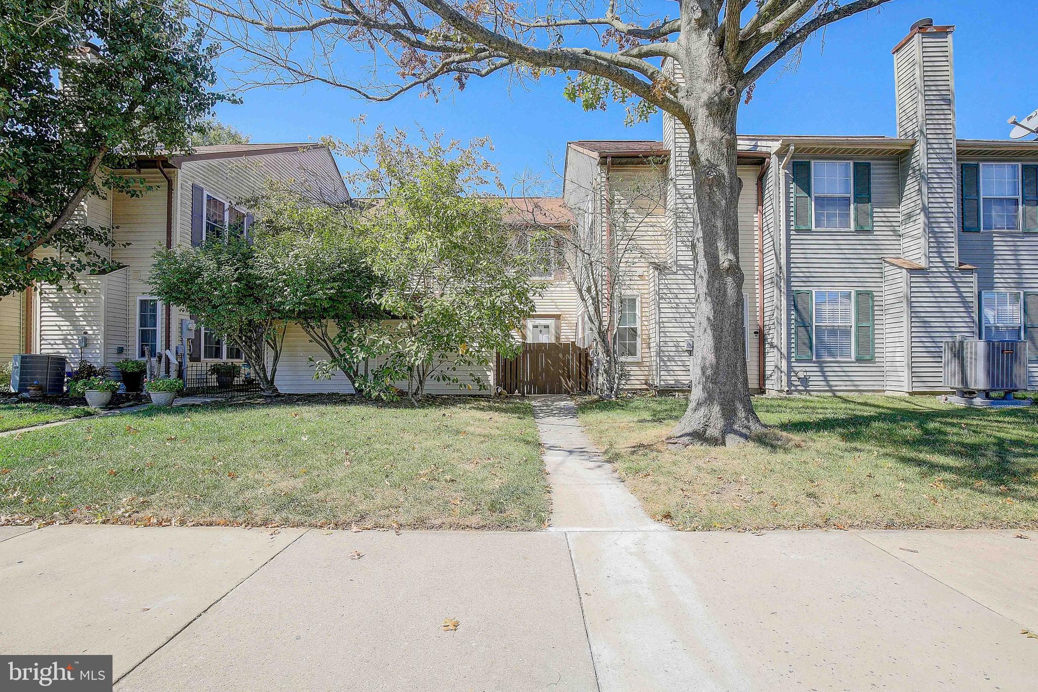 Welcome to the much sought after community of Mitchellville Townhouses . This cozy two level home feature a large living room and separate dining room.  The home has been recently refreshed with fresh paint, new luxury premium vinyl flooring, and updated fixtures.  This home features two large bedrooms and two full baths.  The owner's suite features lots of closet space, beautiful hardwood floors, and a recently refreshed en suite bath.  The front on the home has a large patio perfect for outdoor entertaining.  This home makes the perfect started home, downsize or rental investment.  This location is ideal for an easy commute to Washington DC.