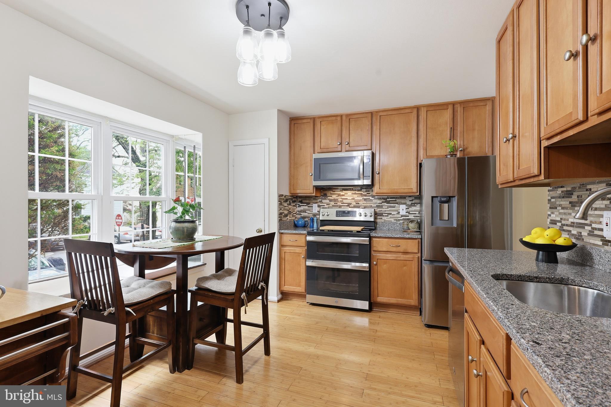 Welcome to Pinewood Station! This well-maintained 4BR/2.5BA brick-front townhome with fully owned solar panels offers the perfect blend of comfort, convenience, and charm, all within the desirable Fairfax County school district. Filled with natural light and featuring thoughtfully maintained landscaping, this home offers a warm and inviting feel throughout.

Inside, you’ll find spacious living areas, generously sized bedrooms, and a functional layout ideal for both everyday living and entertaining. The kitchen features granite countertops and stainless steel appliances, while numerous recent updates provide added peace of mind, including a new HVAC system (2024), water heater (2025), refrigerator and stove (2025), washer and dryer (2025), fresh paint (2026), updated carpet and flooring on the main and upper levels (2023), and new basement flooring (2026). Owned solar panels with warranty coverage through 2040 help provide increased energy efficiency and lower utility costs.

Enjoy outdoor space for relaxing, gardening, or entertaining. Conveniently located near shopping, dining, commuter routes, and everyday amenities, this home is a fantastic opportunity for buyers seeking both value and location in Northern Virginia.
