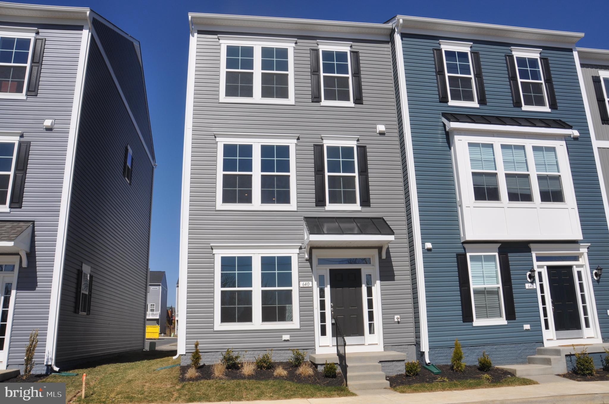 Just built, new to the market and never lived in, end unit townhouse style condo. Walking distance to Creekside Shopping Center.  Walk into a  lovely sitting room with access to a 2 car garage. The main level features a beautiful open sun filled living area, expansive contemporary kitchen, large island., vinyl plank flooring,  and deck. The upper bedroom level is carpeted and laundry room in the hallway.  This luxurious home is conveniently located in The City of Winchester with all of charm that the area has to offer.