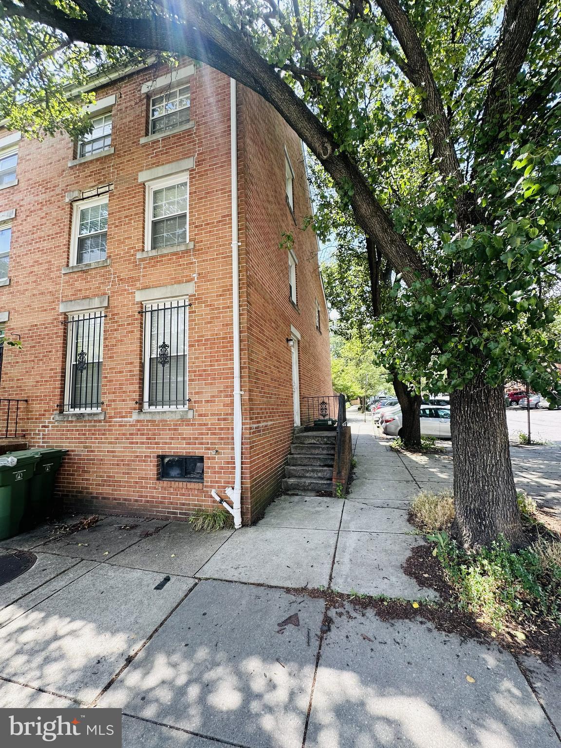 Priced to Sell – Incredible Opportunity in Upper Fells Point!

Don't miss this chance to own a spacious end-of-group townhome in one of Baltimore's most sought-after neighborhoods. Offering 3 bedrooms, 2 full baths, and built in 1983, this home provides a newer floor plan and generous room sizes rarely found in the surrounding historic homes.

Step inside to find a bright and inviting living room featuring exposed brick, adding warmth and character. The expansive open kitchen offers abundant cabinet and counter space and flows seamlessly to a private rear courtyard surrounded by brick walls and mature greenery—your own peaceful urban retreat, perfect for relaxing, entertaining, or container gardening.
Natural light pours in through the skylights, while ample closet space provides the storage today's buyers are looking for. As an end-of-group home, you'll enjoy additional windows and enhanced privacy.

Located in the heart of Upper Fells Point, you're just minutes from Johns Hopkins Hospital, the waterfront, Patterson Park, restaurants, coffee shops, nightlife, and all the charm that makes city living so desirable.

Whether you're a homeowner looking to build equity or an investor seeking a prime location, this property offers exceptional value. A similar home just a few doors away recently sold for $293,000, making this an outstanding opportunity with potential instant equity.

Schedule your showing today and discover the possibilities this Upper Fells Point gem has to offer!